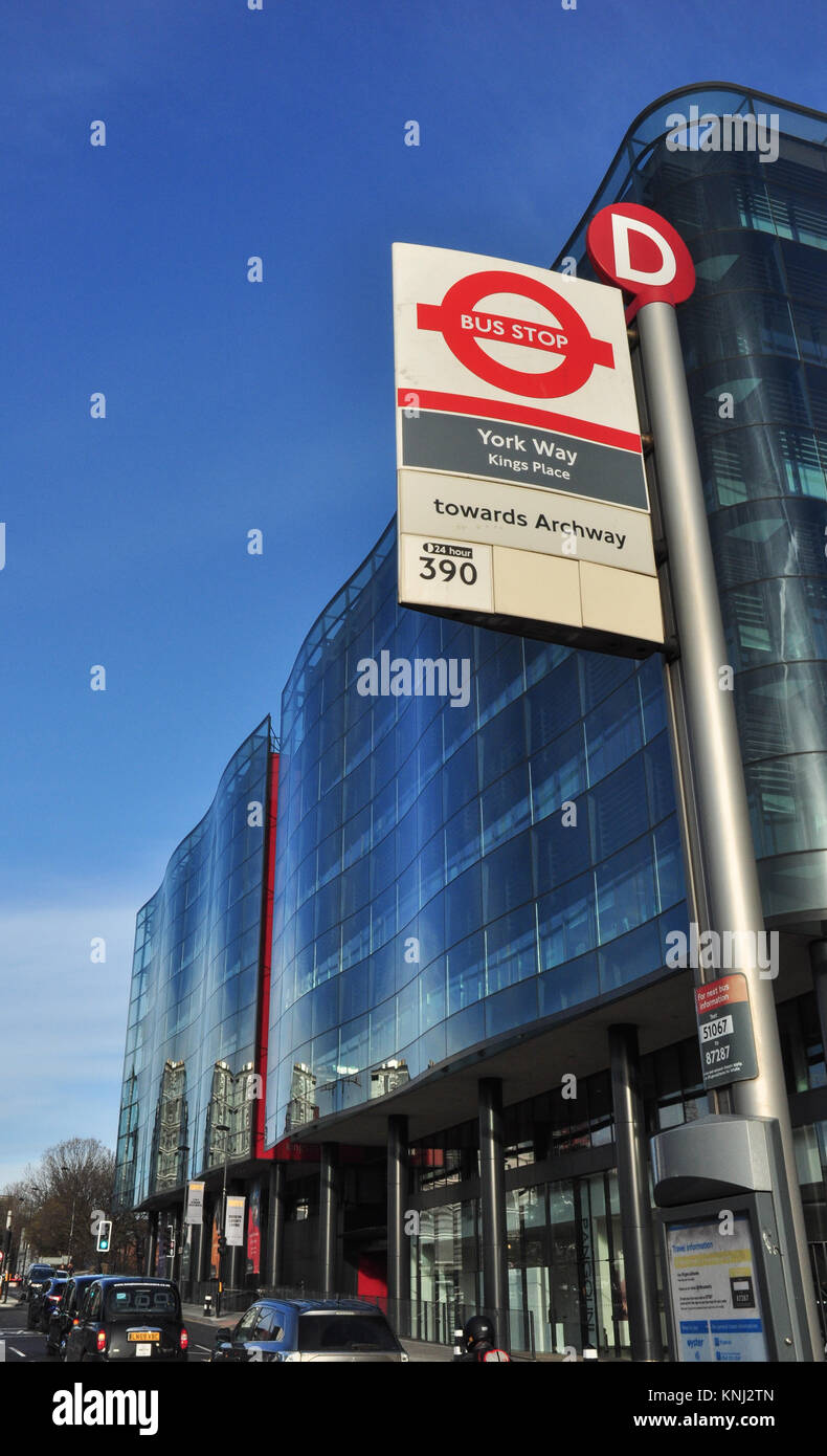 Bus stop and modern glazed building, Kings Place, York Way, London, England, UK Stock Photo