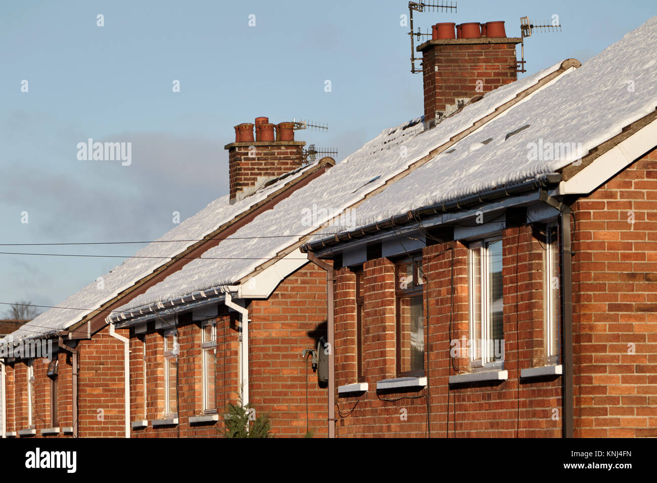 snow covered rooves of older housing stock newtownabbey northern ireland uk Stock Photo