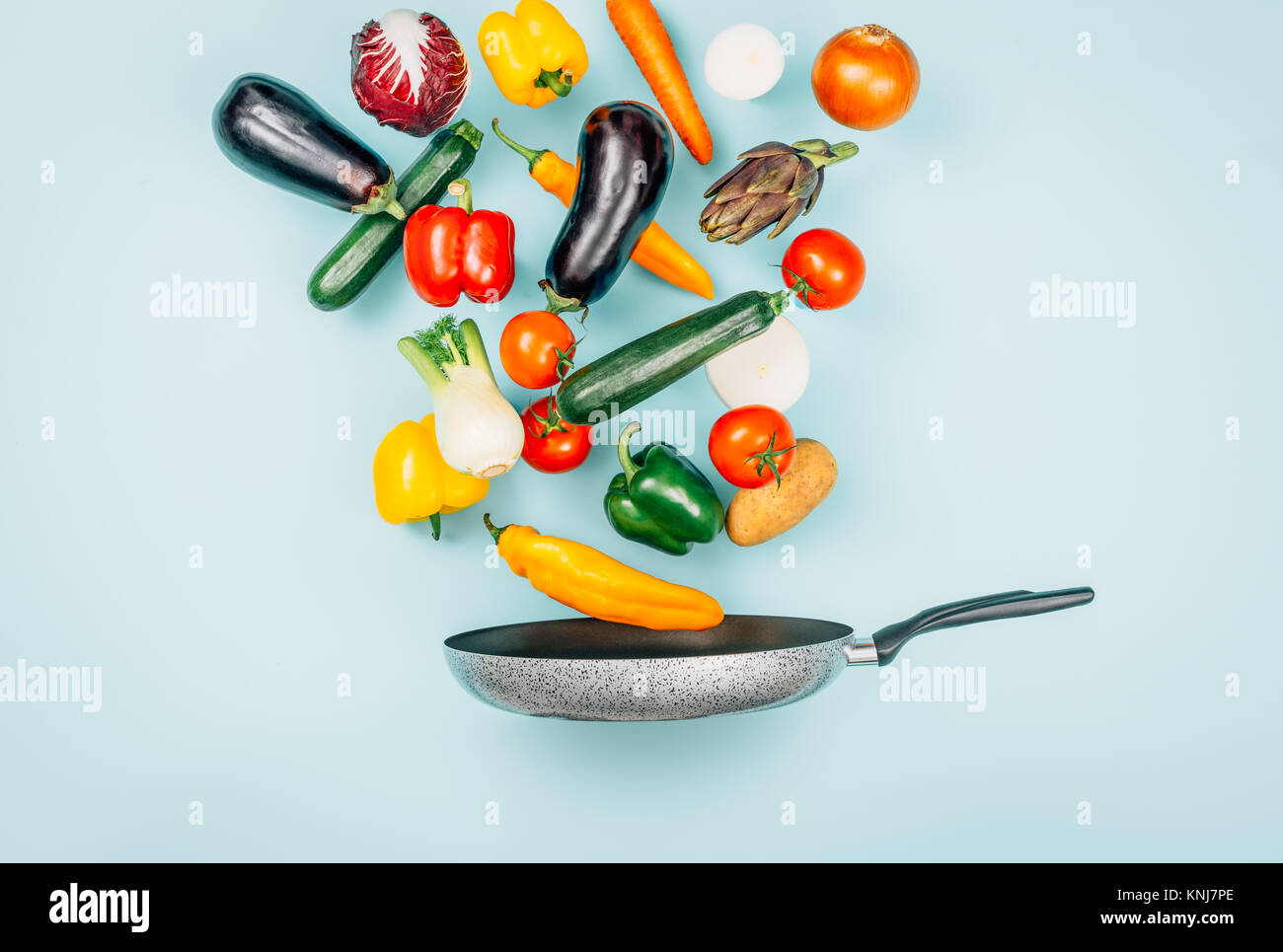 Pan Falling Food falling into pan hi-res stock photography and images - Alamy
