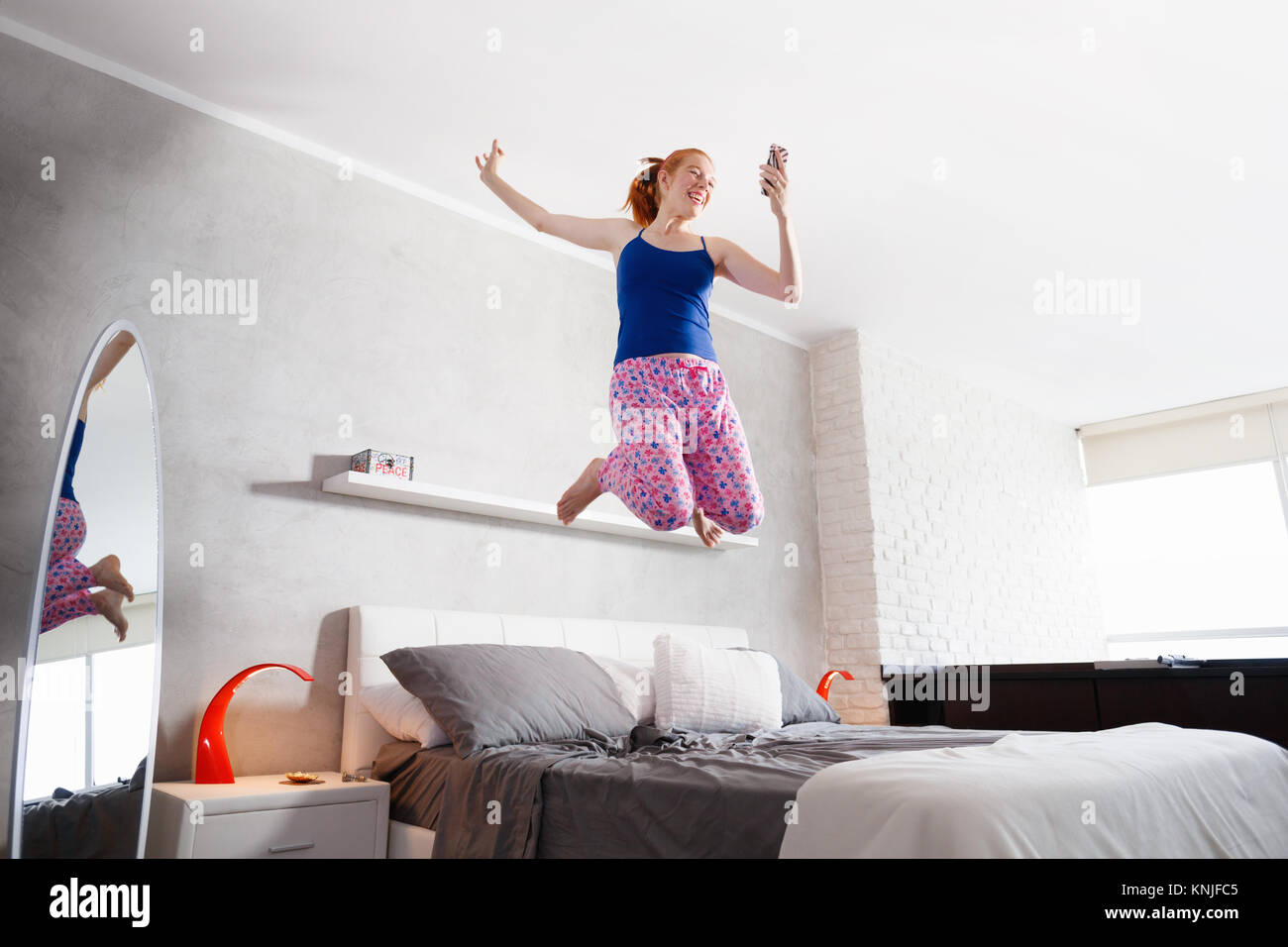 Jumping for joy bed hires stock photography and images Alamy