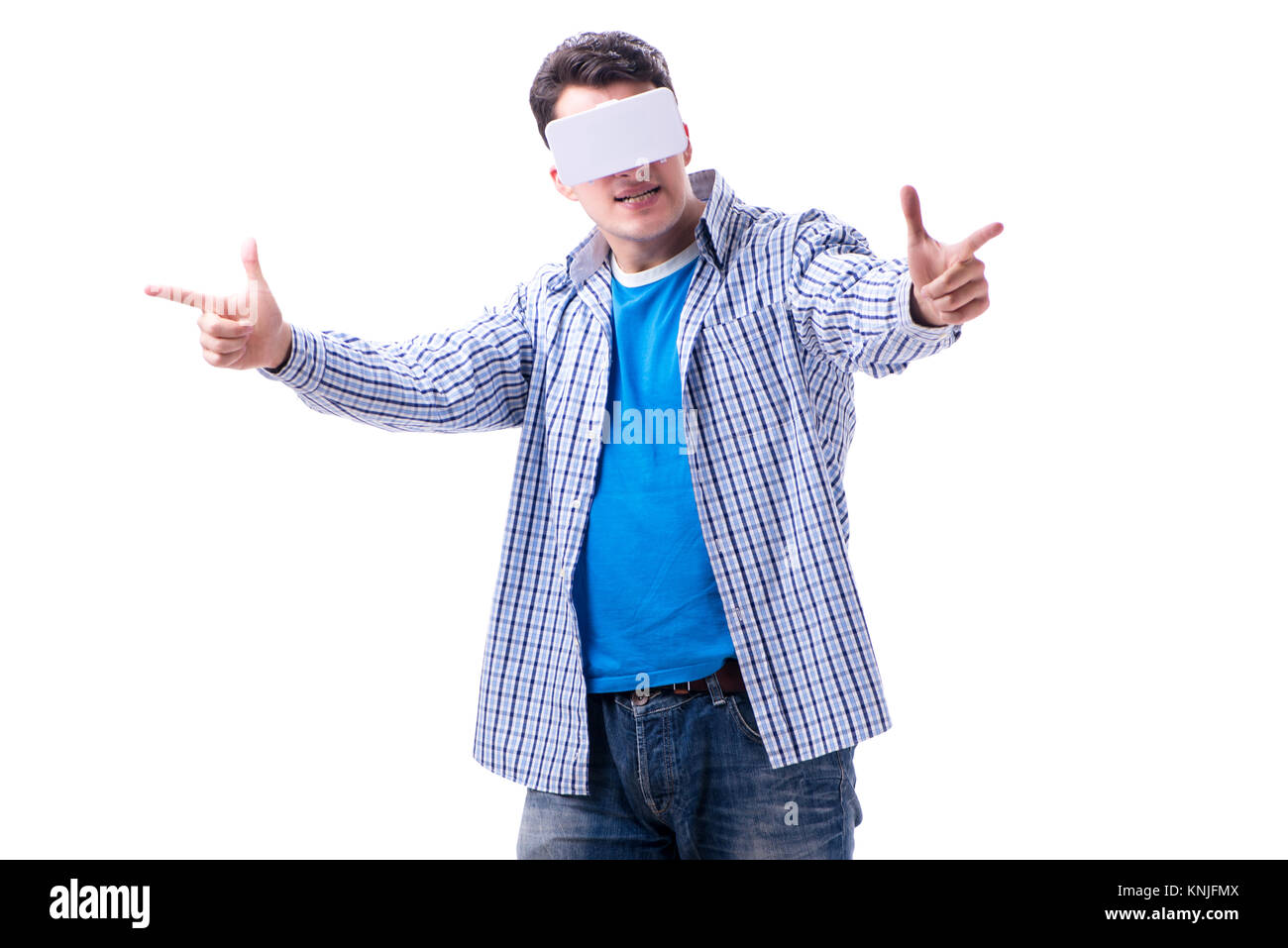 Young man wearing virtual reality VR glasses Stock Photo - Alamy