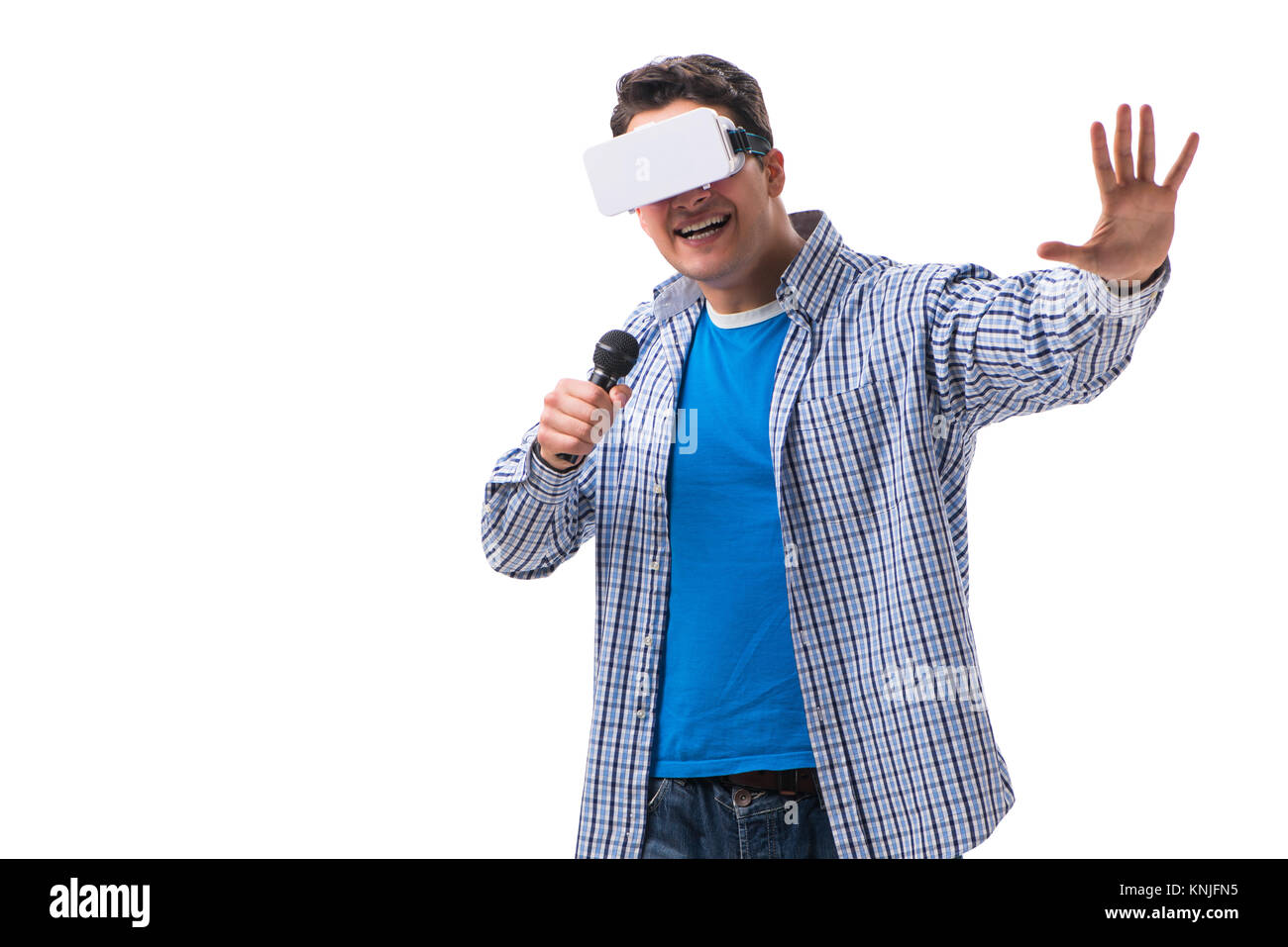 Young man wearing virtual reality VR glasses Stock Photo - Alamy