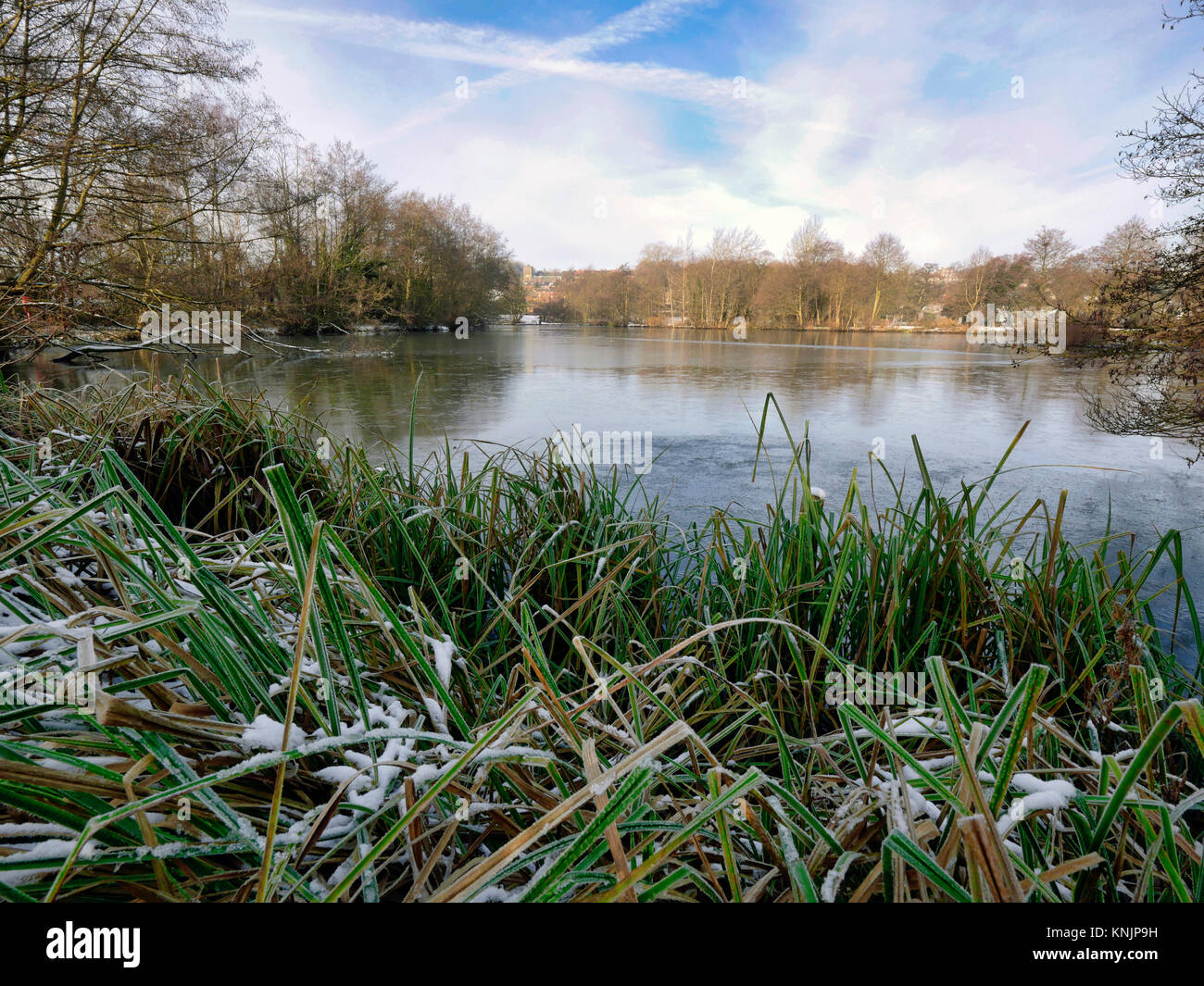 Ashbourne, Derbyshire. 12th Dec, 2017. UK Weather frozen ice on a lake