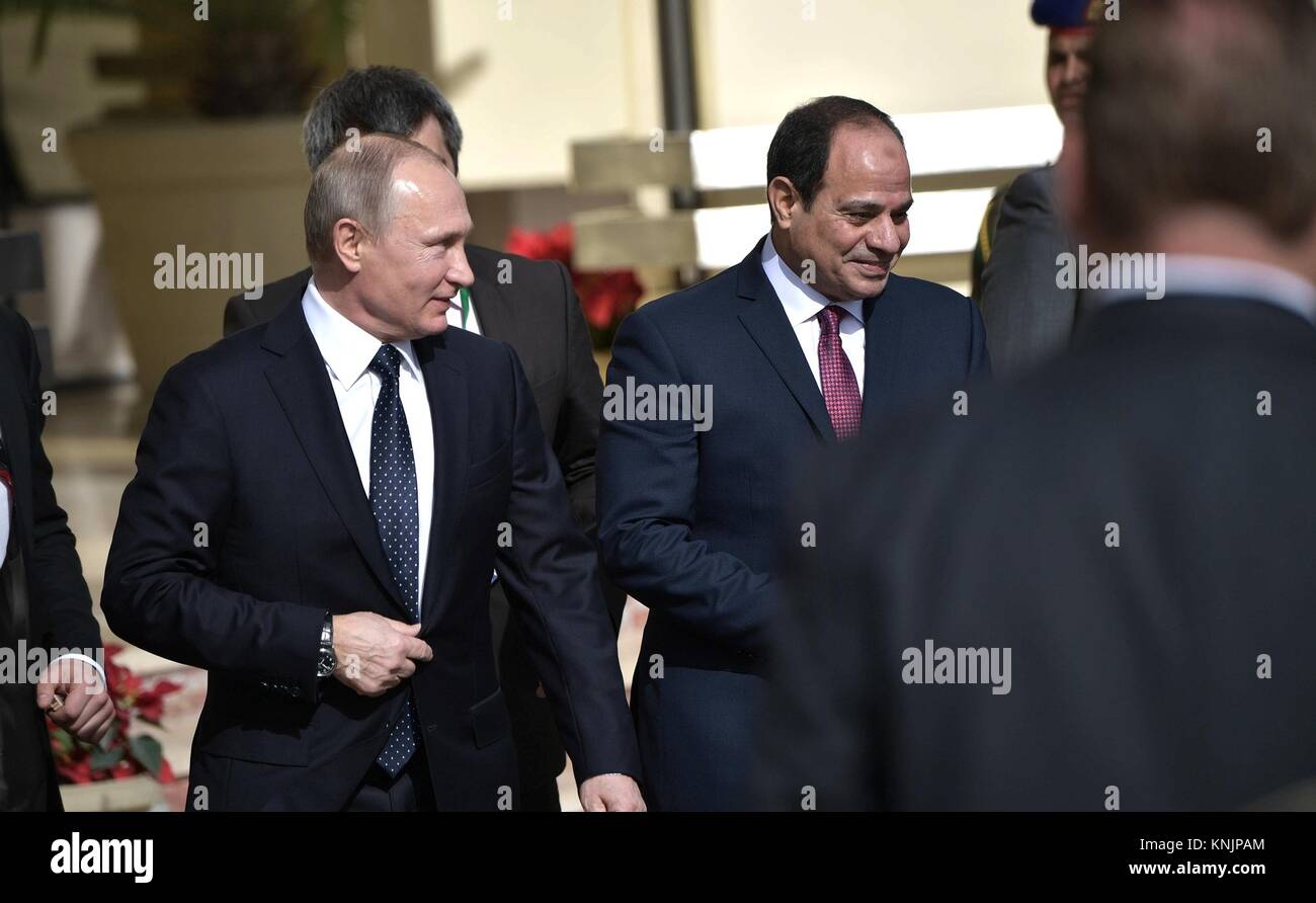 Egyptian President Abdel Fattah el-Sisi, right, escorts Russian President Vladimir Putin before holding talks December 11, 2017 in Cairo, Egypt. Stock Photo