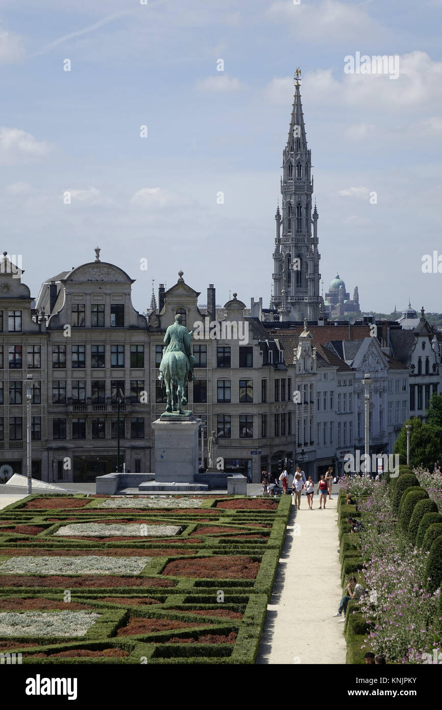 The view across the gardens and the equestrian statue of King Albert I on the Mont des Arts, to the tower of the town hall at the Grand Place in the Belgian capital Brussels, pictured on 25.06.2017. The 96-metre-high late Gothic belfry is by Jan van Ruysbroeck, the architect of Philip the Good. From 1449 to 1455 the tower was built in place of a previous tower. On top of the tower is a gilded statue of the archangel Michael, patron saint of the city of Brussels, fighting the dragon. - NO WIRE SERVICE - Photo: Sascha Steinach/dpa-Zentralbild/dpa | usage worldwide Stock Photo