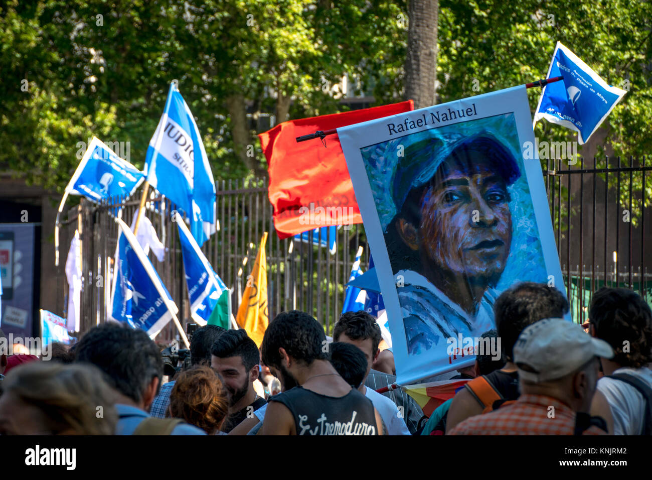 December 7, 2017 - Buenos Aires, Ciudad AutÃ³noma de Buenos Aires, Argentina - Above the crowd appears a poster of Rafael Nahuel, a young Mapuche man shot by Argentine authorities in November. These protestors are marching with the 'Madres' of Plaza de Mayo, a group of women who's children were disappeared by the Argentine dictatorship in the 1970's. They've been marching outside the government offices in Plaza de Mayo for 40 years. Credit: Jason Sheil/SOPA/ZUMA Wire/Alamy Live News Stock Photo