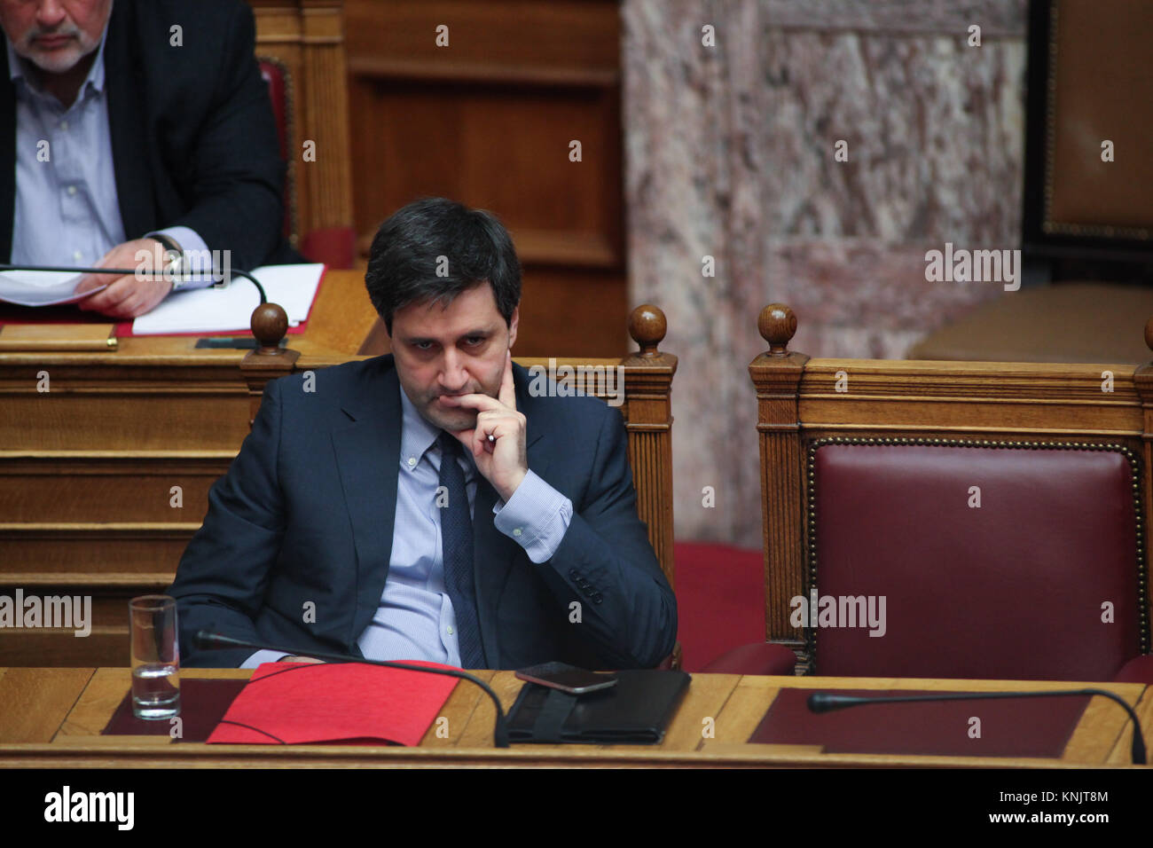 Athens, Greece. 12th Dec, 2017. George Chouliarakis, the Alternate Minister of Finance in Greece. First day of the State Budget Debate at the Greek Parliament. The government of Syriza and Anel present what they promote as the 'last state badget in times of memorandum'. Credit: Ioannis Mantas/Alamy Live News Stock Photo