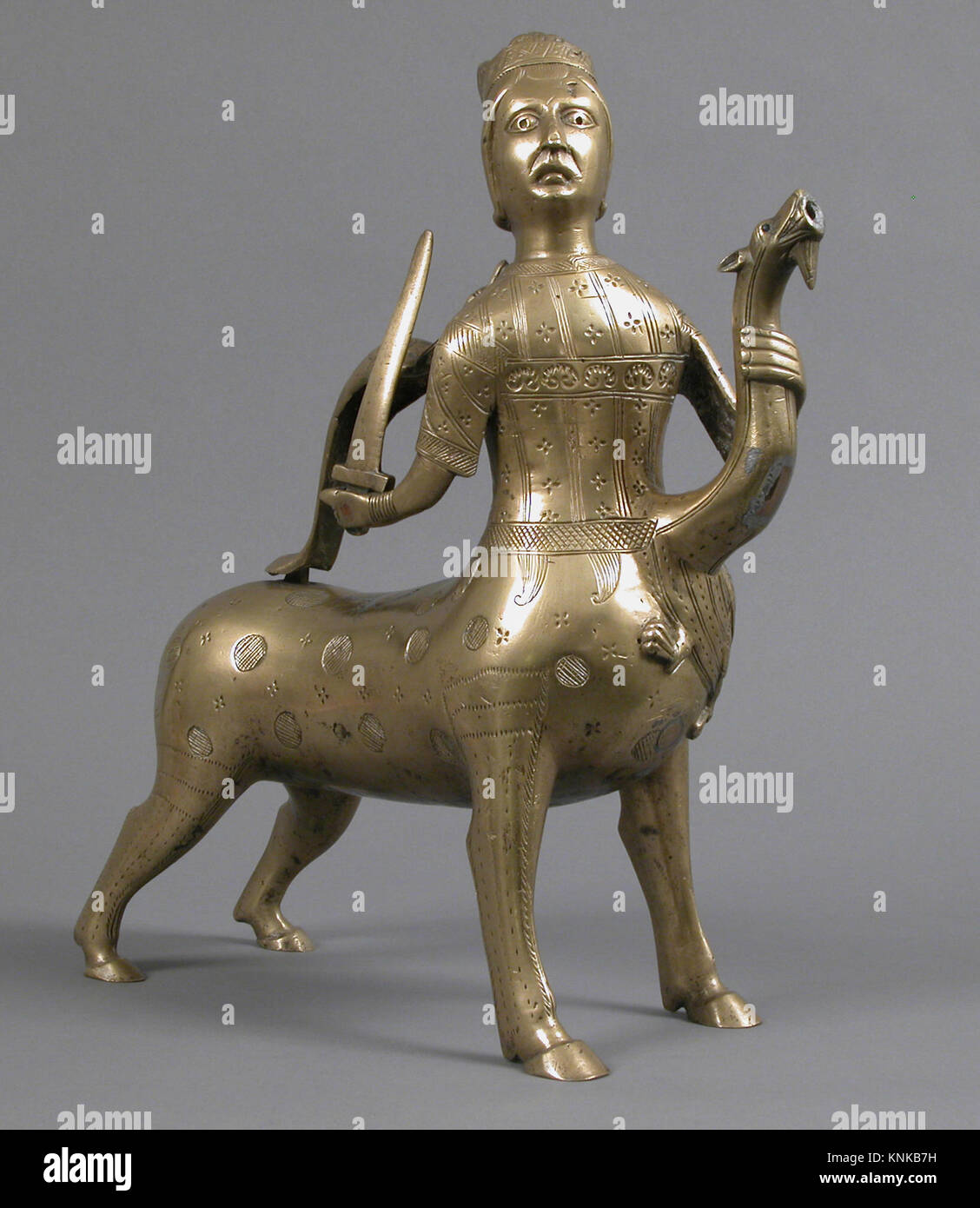 Aquamanile in the Form of a Crowned Centaur Fighting a Dragon, German, Date: 1200–1225, Made in possibly Hildesheim, Lower Saxony, Germany, Medium: Copper Alloy Stock Photo