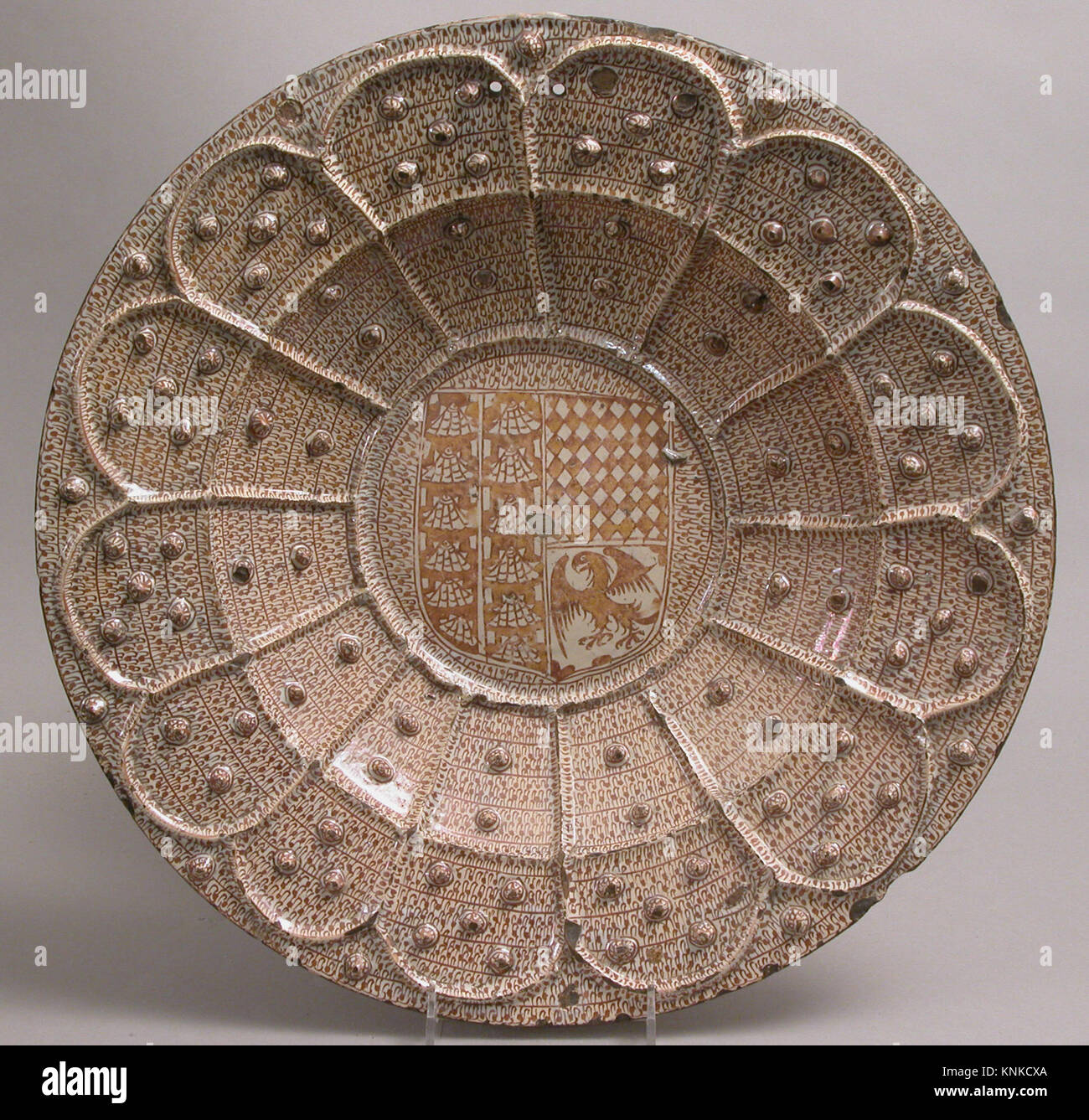 Dish with Heraldic Shield, 1470–1500, Spanish, Made in probably Manises, Valencia, Spain, Medium: Tin-glazed earthenware Stock Photo