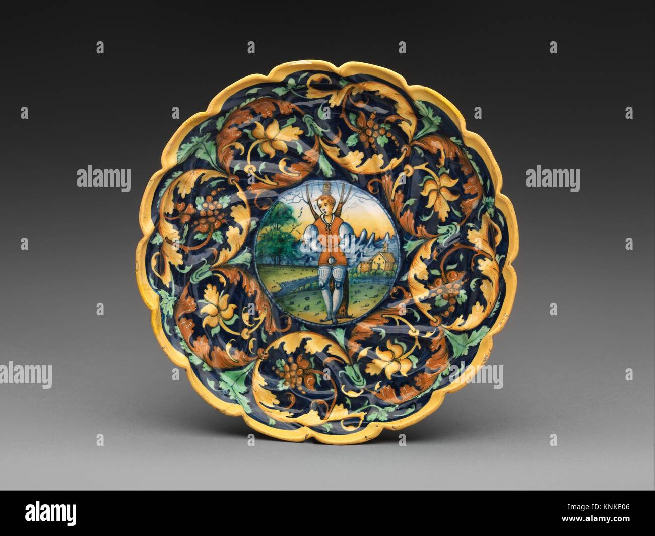 Bowl with A Lover Tied to a Tree. Date: ca. 1535-40; Culture: Italian, Faenza; Medium: Maiolica (tin-glazed earthenware); Dimensions: Overall Stock Photo