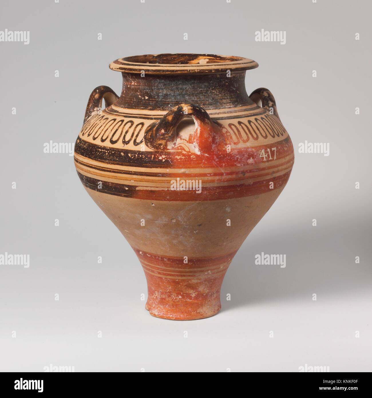 Terracotta pithoid jar. Period: Late Helladic III; Date: ca. 1400-1050 B.C; Culture: Mycenaean; Medium: Terracotta; Dimensions: H. 6 5/16 in. (16 Stock Photo