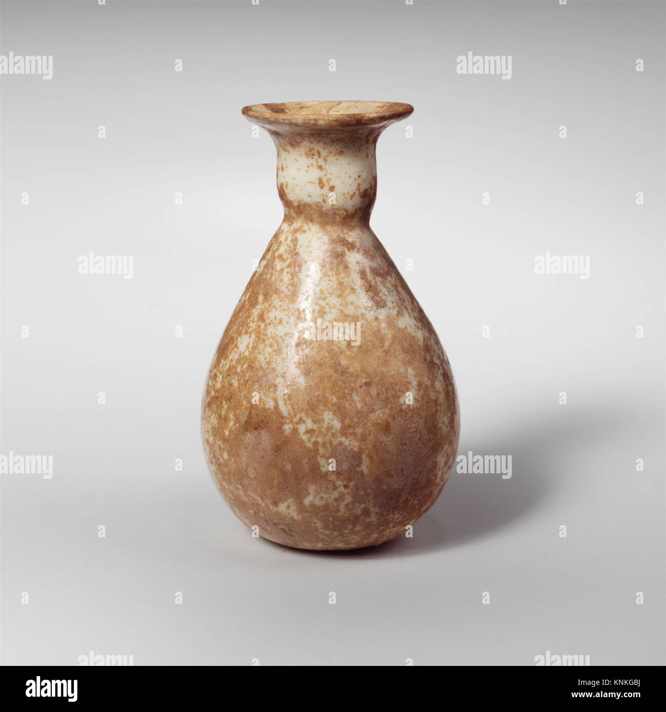 Glass miniature perfume bottle. Period: Early Imperial; Date: early 1st century A.D; Culture: Roman; Medium: Glass; blown; Dimensions: Overall: 1 Stock Photo