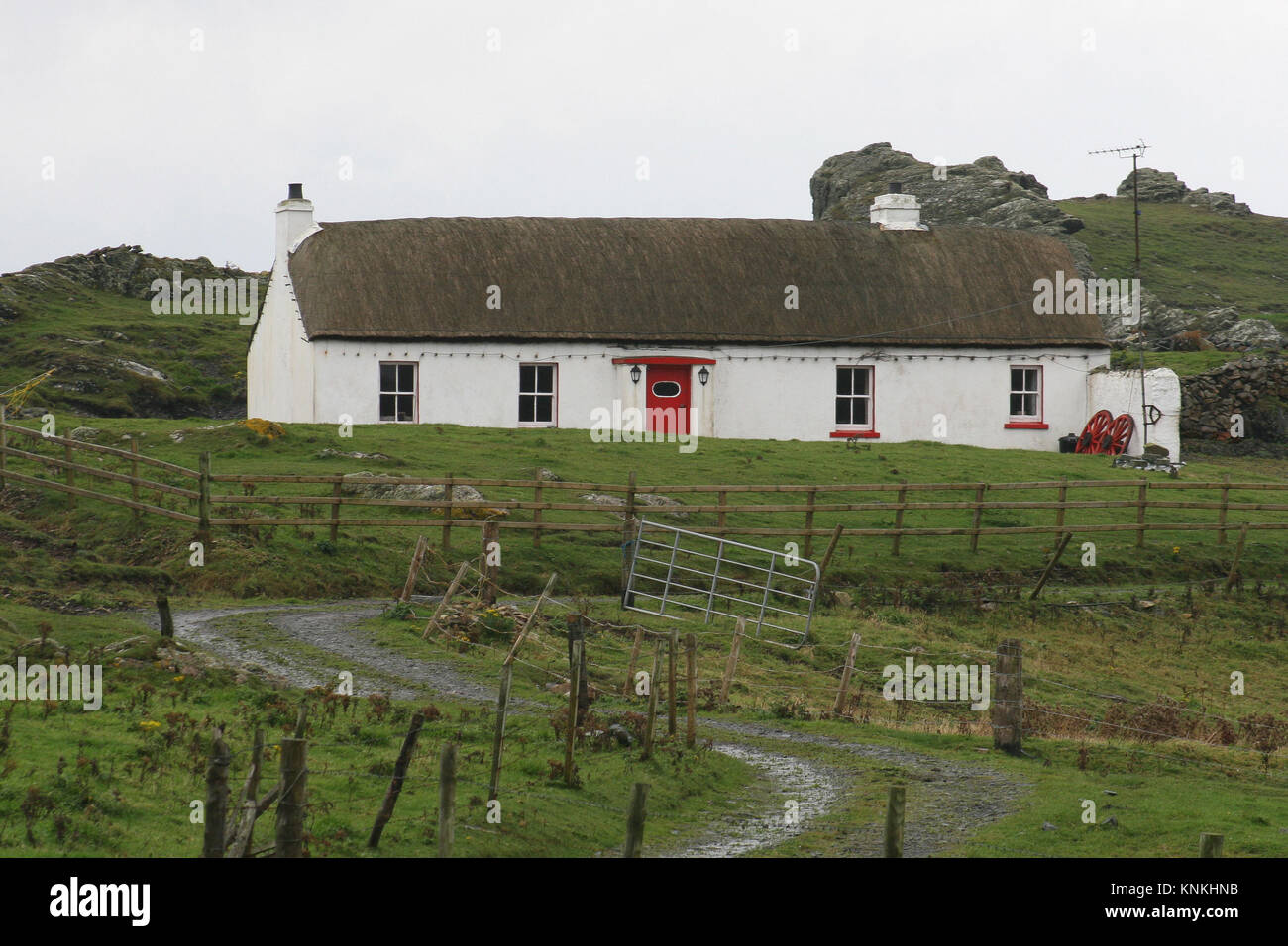 Whitewashed cottage with thatched roof at Malin Head County Donegal