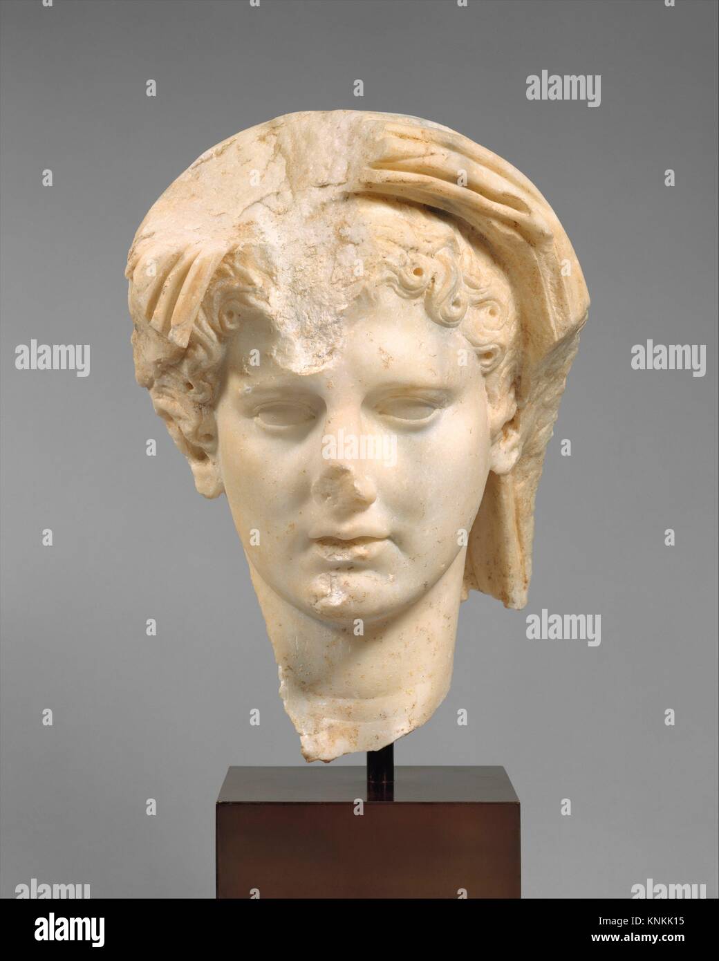 Marble head of a veiled man. Period: Early Imperial, Julio-Claudian; Date: 1st half of 1st century A.D; Culture: Roman; Medium: Marble; Dimensions: Stock Photo