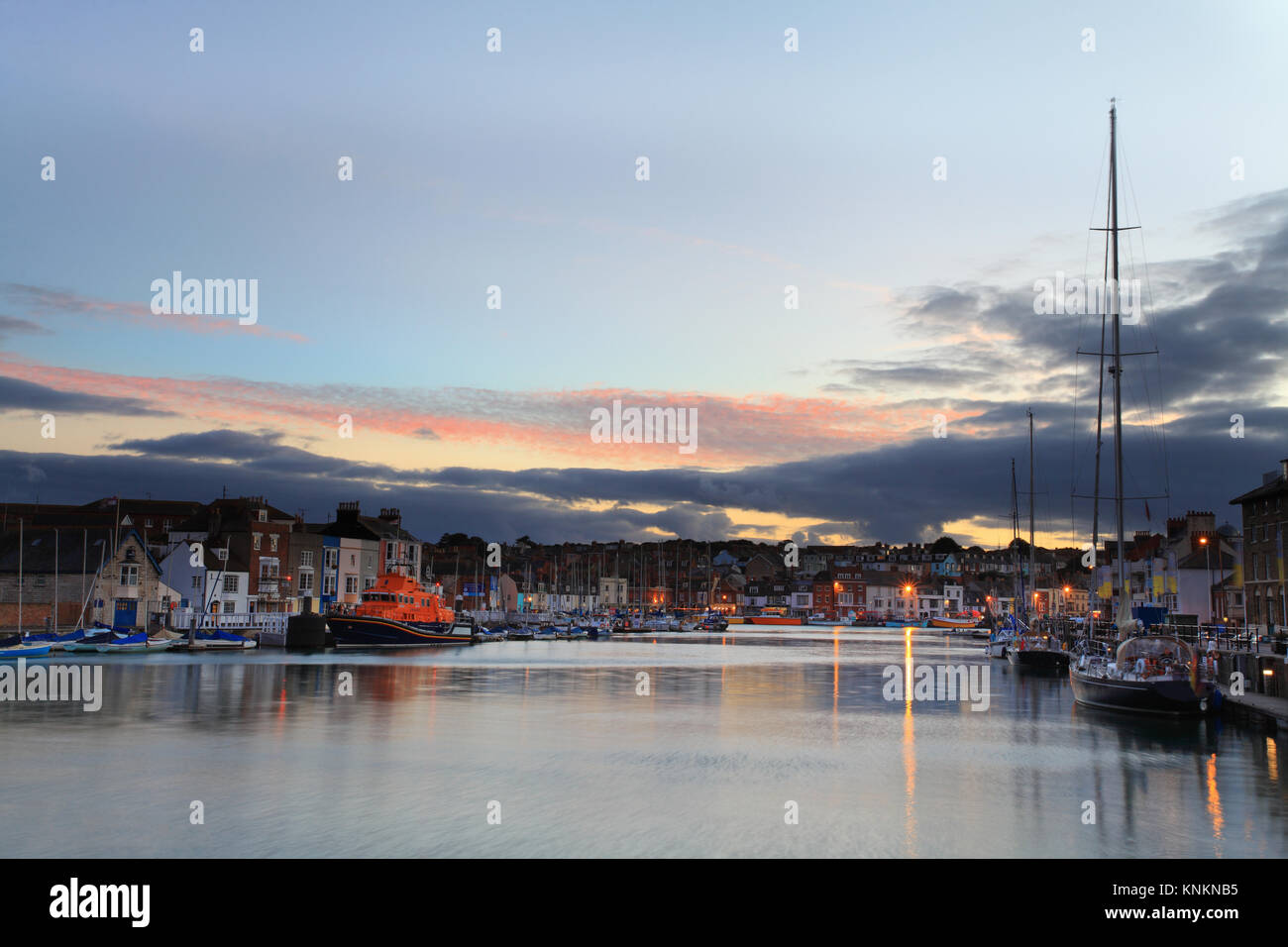 Sunset over Weymouth Quayside Early Autumn Stock Photo