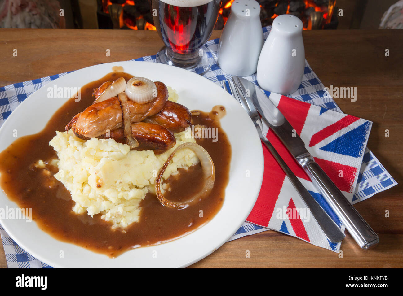 An English pub/restaurant dish of Sausage, Mashed potato and gravy