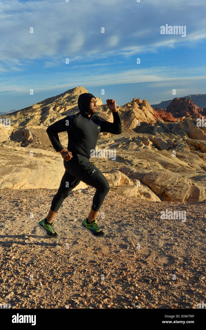 African American man training for 10k run in the Nevada desert. Stock Photo