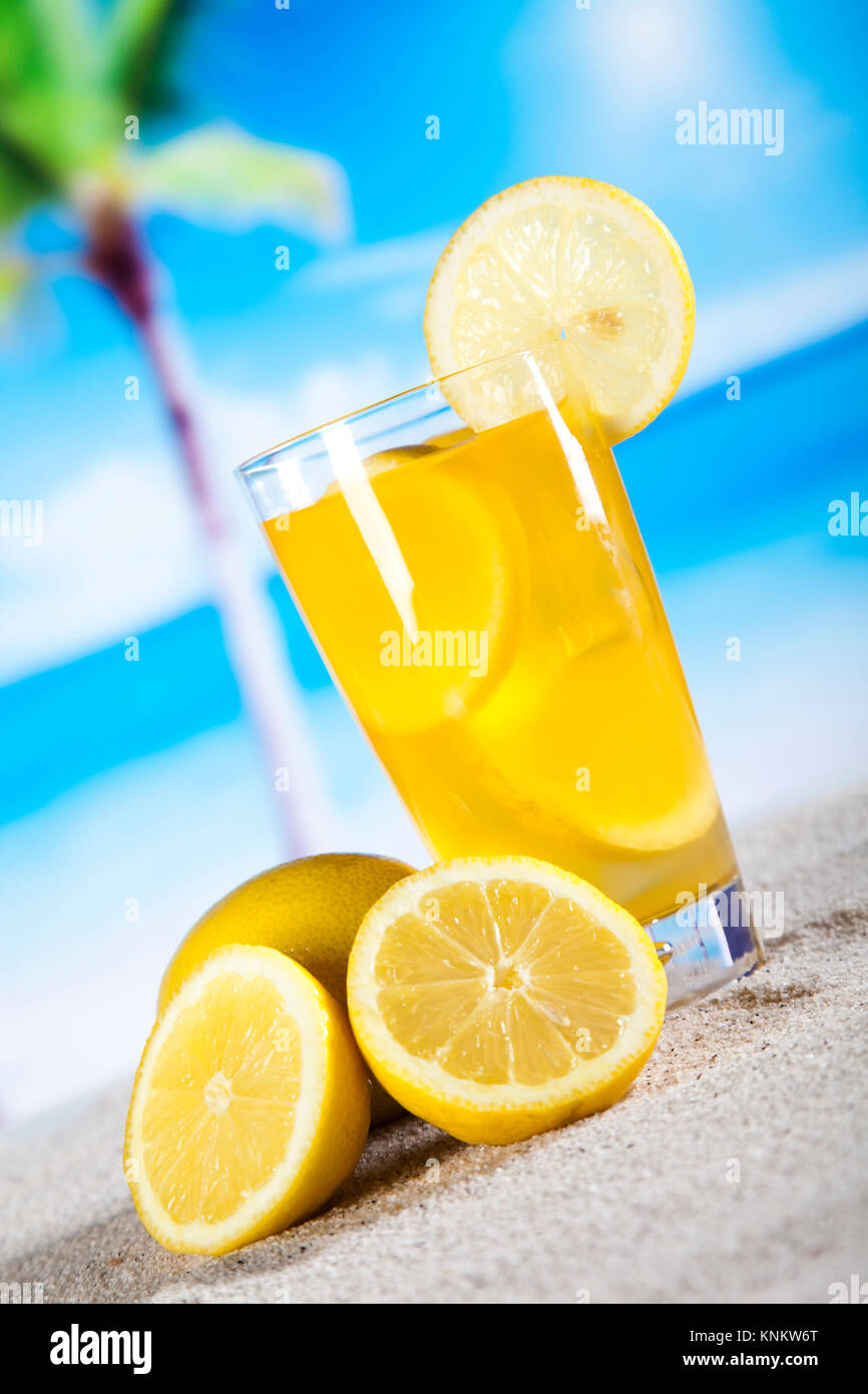 Fruit cocktails on the beach Stock Photo