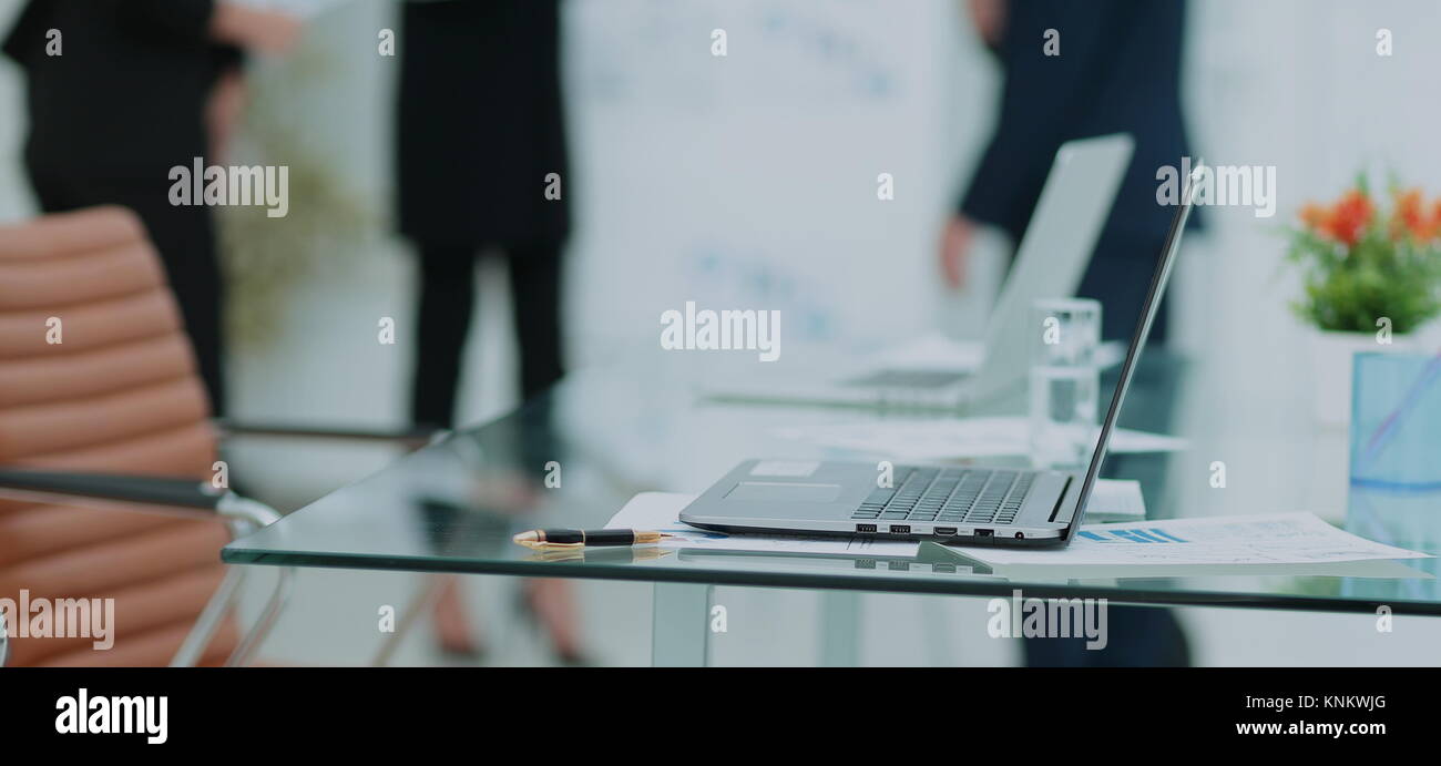 Business team working at the office using laptop Stock Photo - Alamy