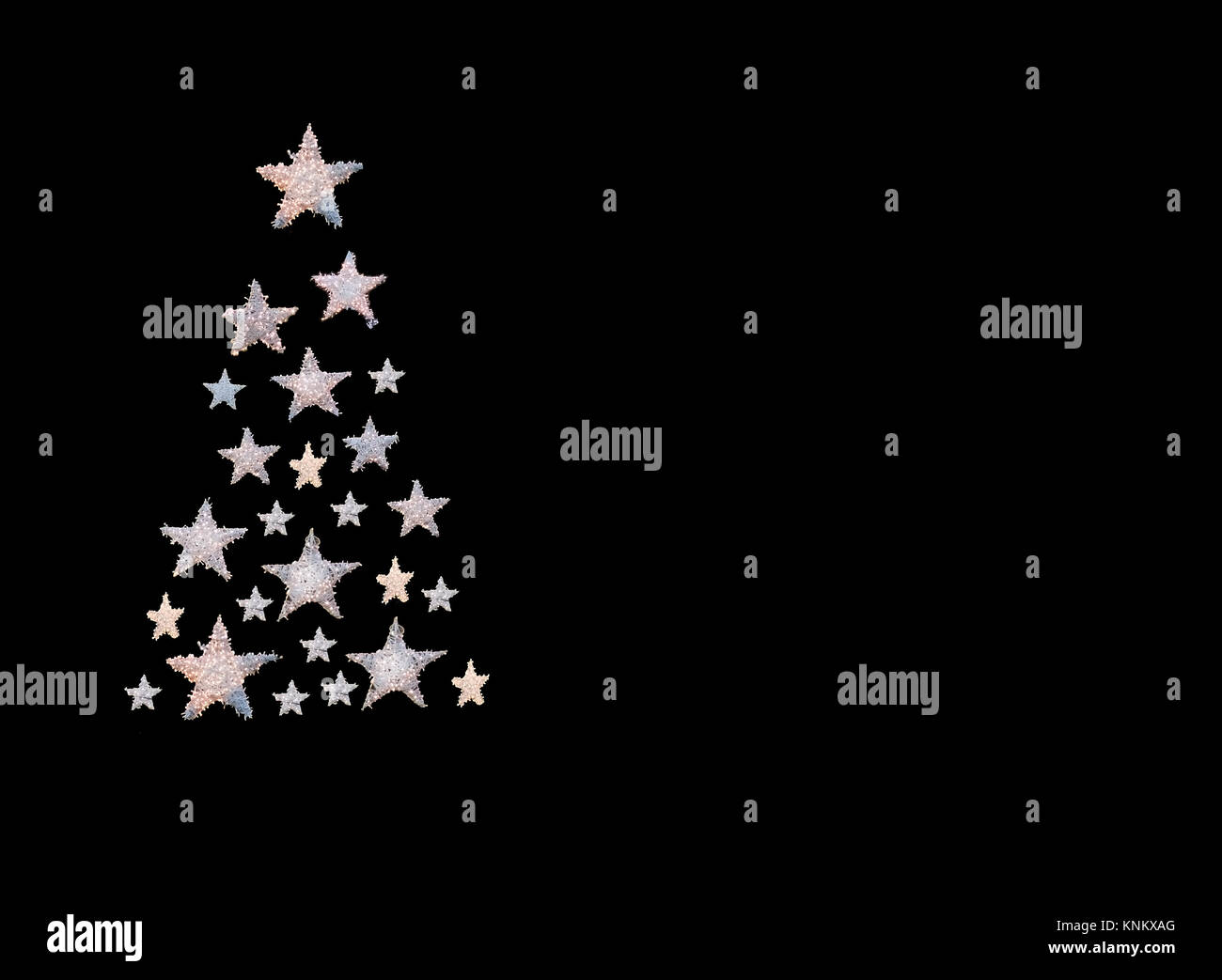 White stars in the shape of a Christmas tree on black background Stock ...
