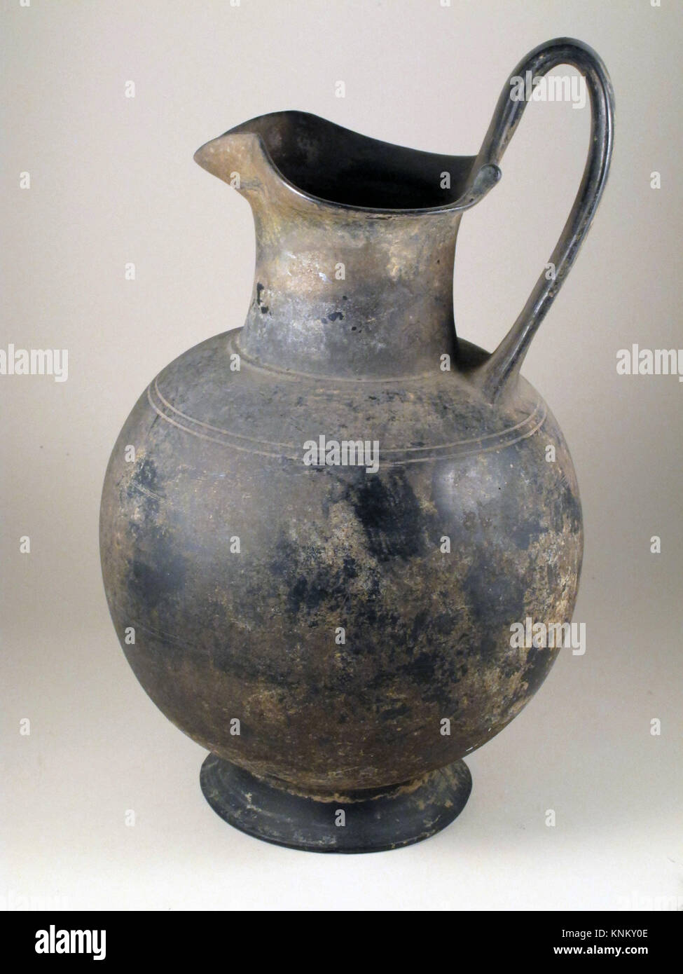 Oinochoe. Date: 7th-6th century B.C; Culture: Etruscan; Medium: Terracotta; Dimensions: 12 3/8 x 7 1/2 in. (31.4 x 19.1 cm); Classification: Vases Stock Photo