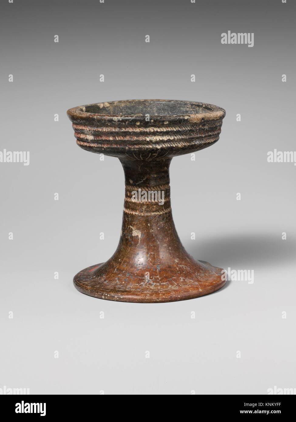 Dish. Culture: Italic, Villanovan; Medium: Terracotta; Dimensions: Overall: 3 7/8in. (9.9cm); Classification: Vases Stock Photo