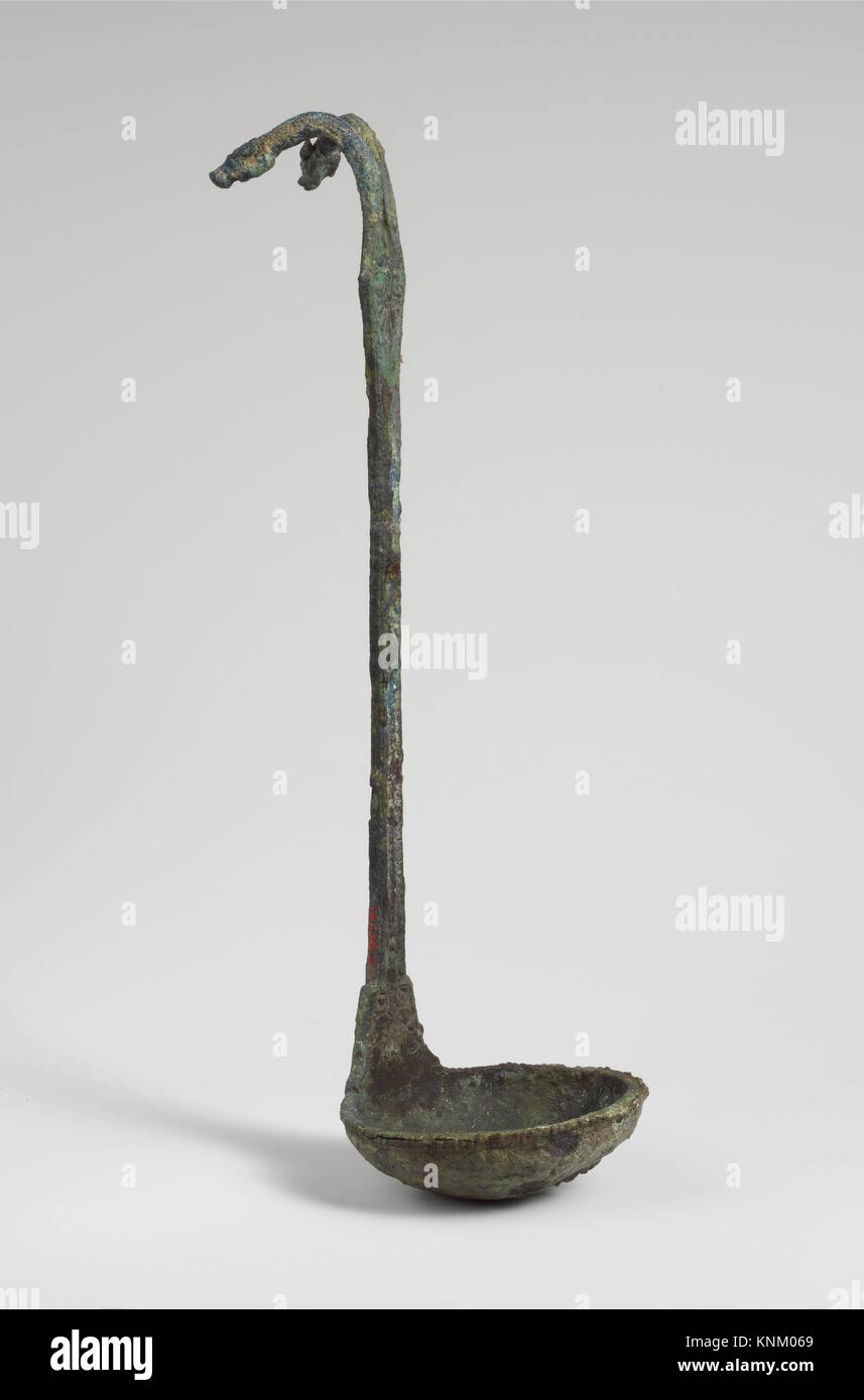 Bronze kyathos (ladle) with animal-head terminals. Period: Classical; Date: late 5th century B.C; Culture: Etruscan; Medium: Bronze; Dimensions: Stock Photo