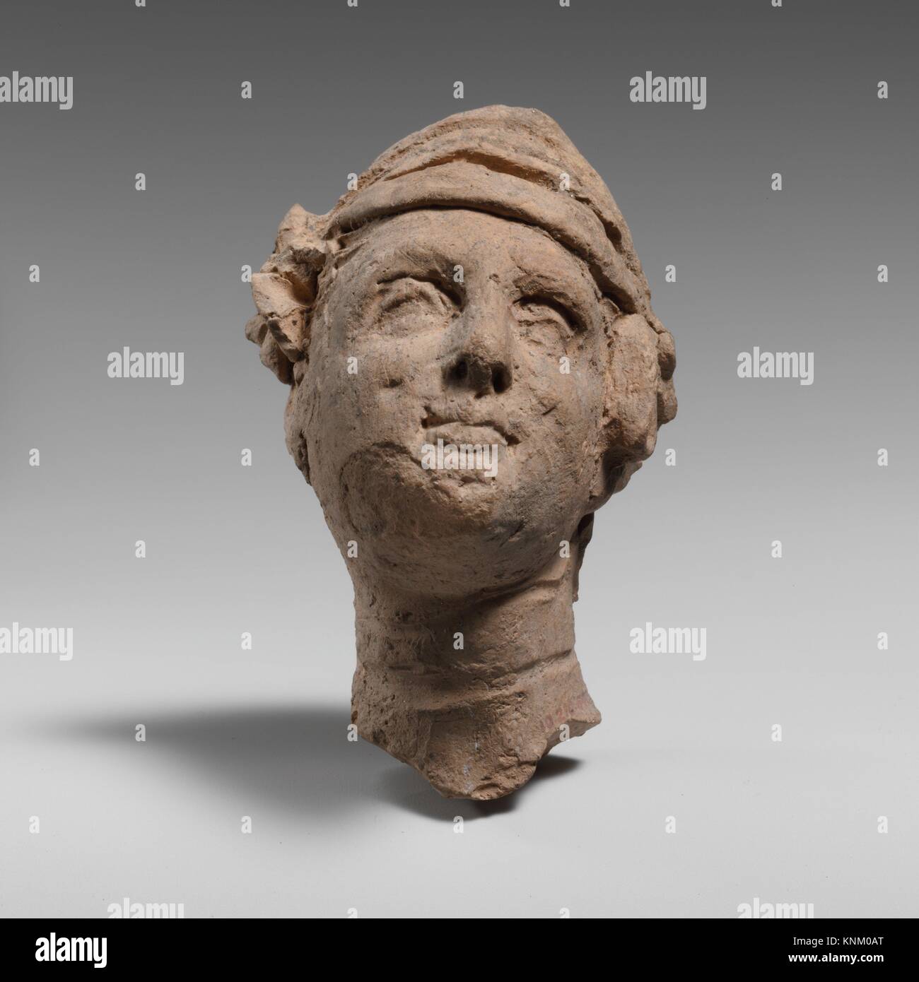 Terracotta head of a woman. Period Classical; Date 4th century B.C
