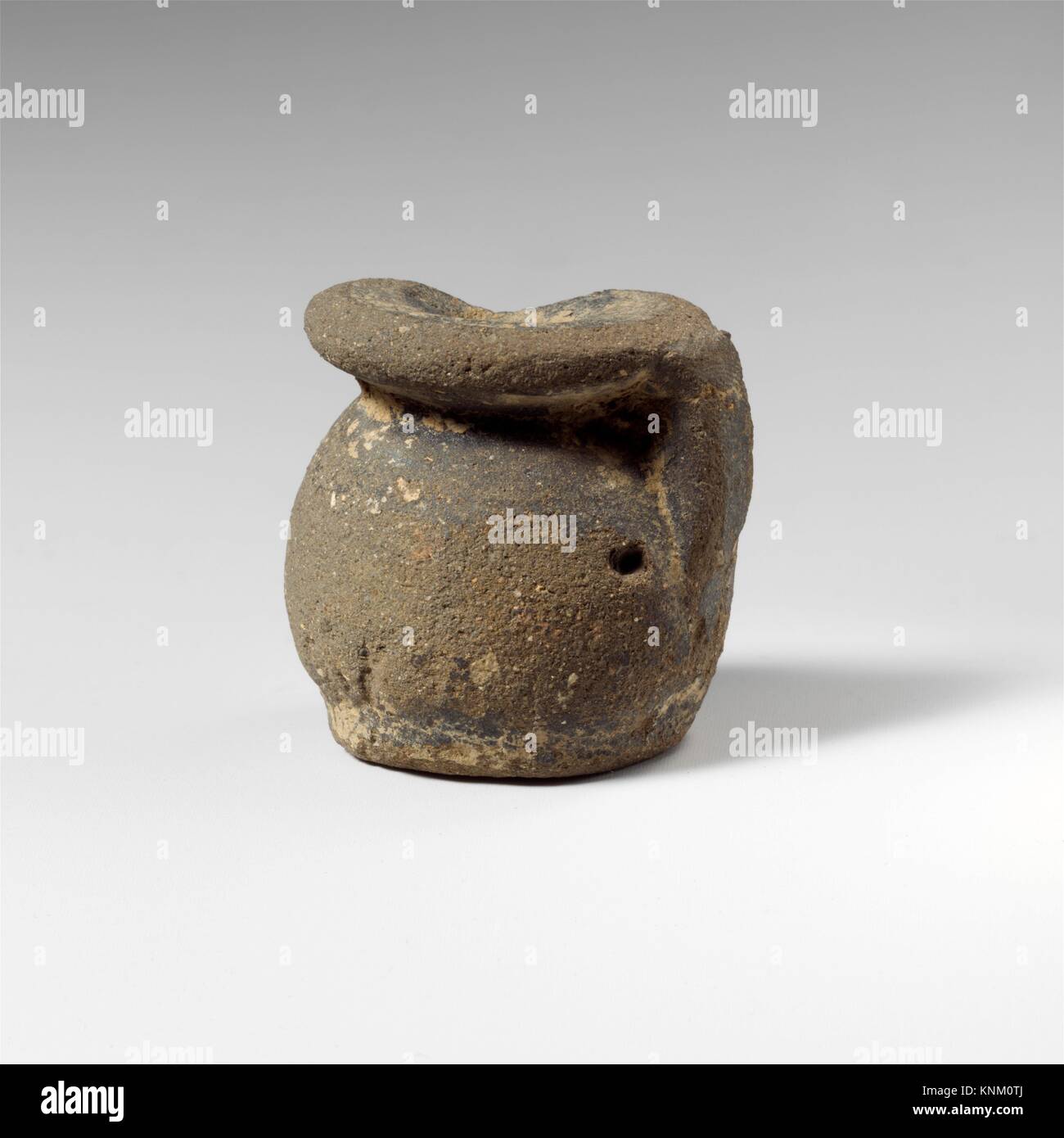 Terracotta miniature vase with one handle. Period Archaic; Date 7th