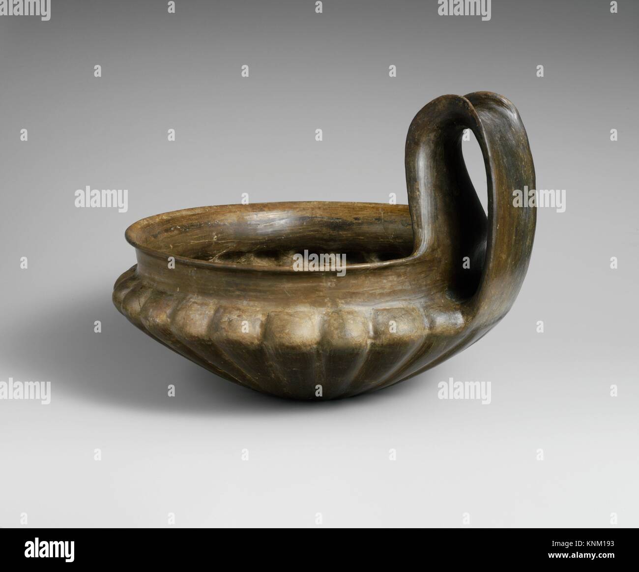 Terracotta kyathos (single-handled cup). Period: Italic; Date: 7th century B.C; Culture: Late Villanovan; Medium: Terracotta; buccheroid impasto; Stock Photo