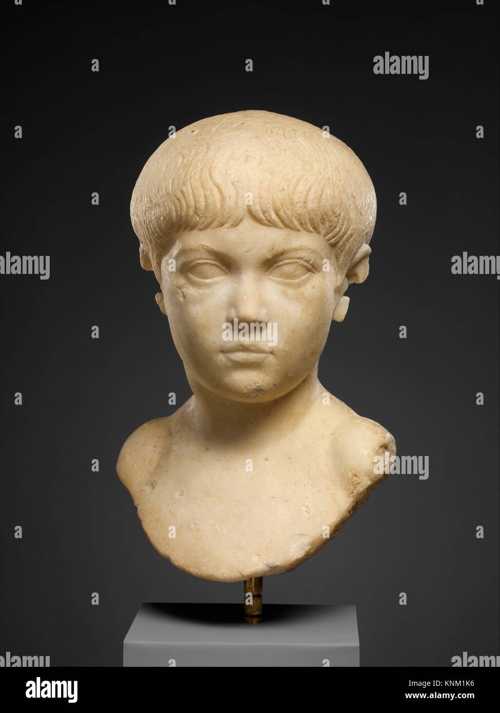 Marble portrait bust of a boy. Period: Early Imperial, Julio-Claudian; Date: ca. A.D. 35-50; Culture: Roman; Medium: Marble; Dimensions: H. 12 1/2 Stock Photo