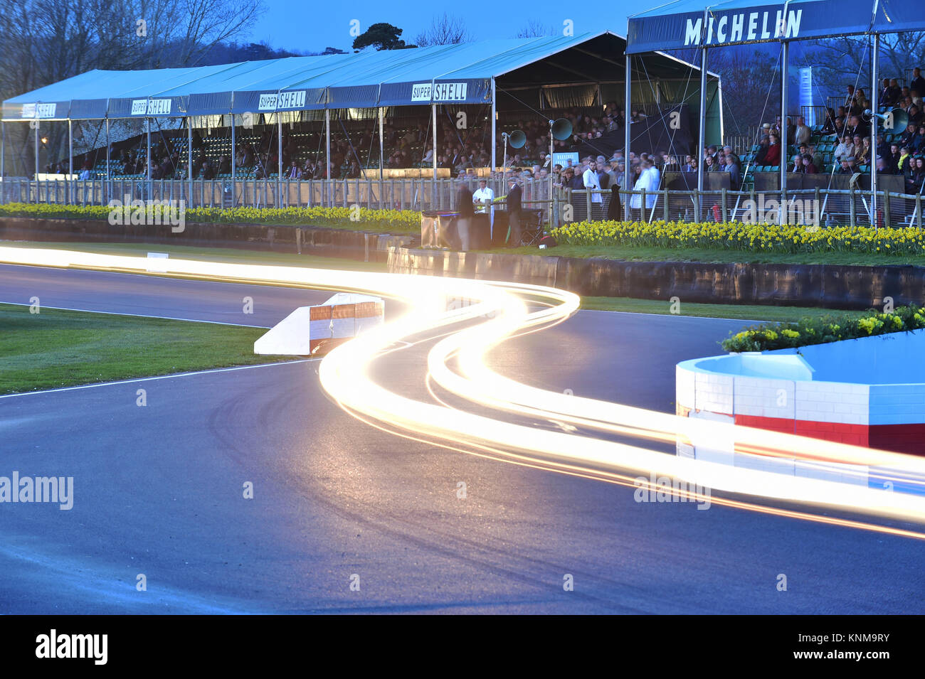 Headlight trails through the chicane. Historic Racing, motor sport, motorsport, nostalgia, racing cars, Goodwood, 72nd members meeting, Moss trophy, Stock Photo