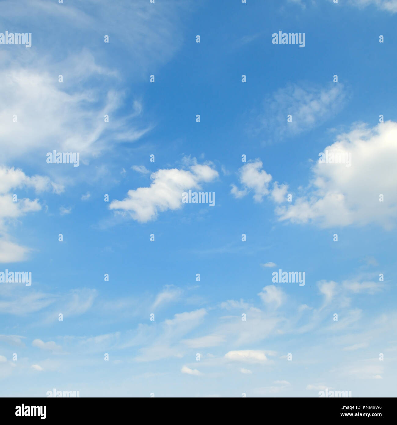 light cumulus clouds in the blue sky Stock Photo - Alamy