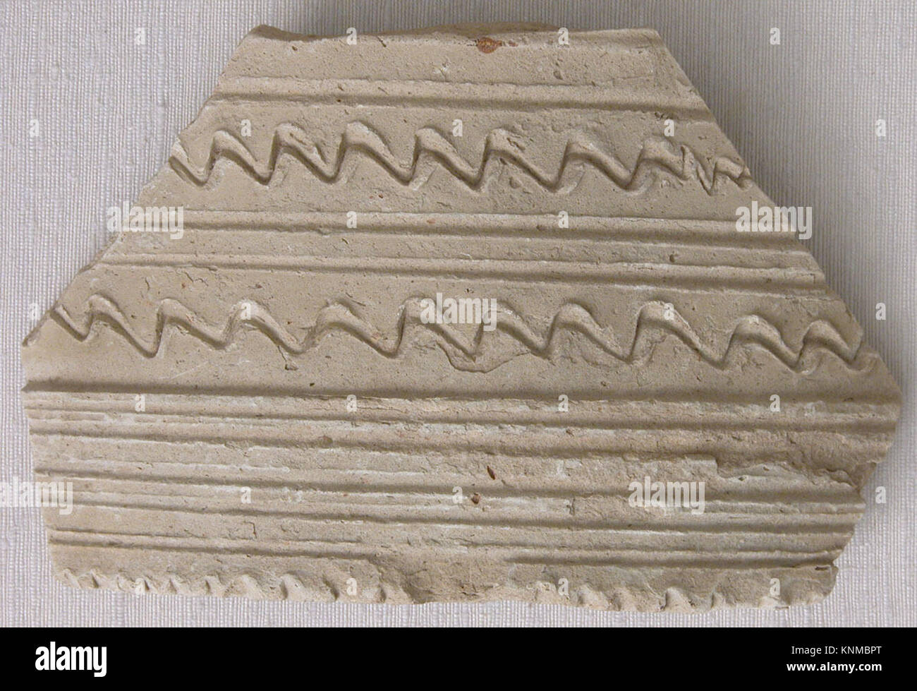 Fragment, 8th-9th century, Found/excavated Iraq, Ctesiphon, Medium: Earthenware; incised Stock Photo
