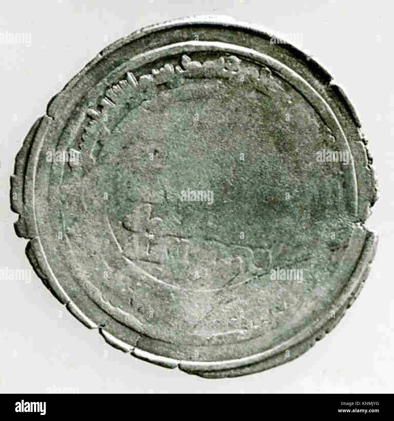 Coin With Inscription Historical coin made of metal, displaying inscriptions and imagery in ...