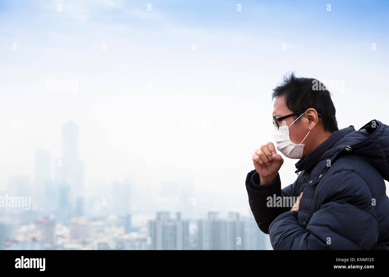 Lung cancer patients with smog city background Stock Photo