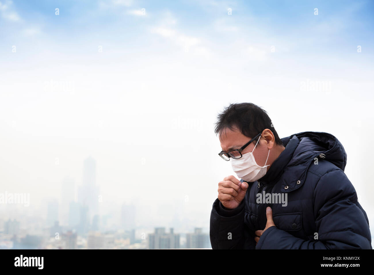 Lung cancer patients with smog city background Stock Photo