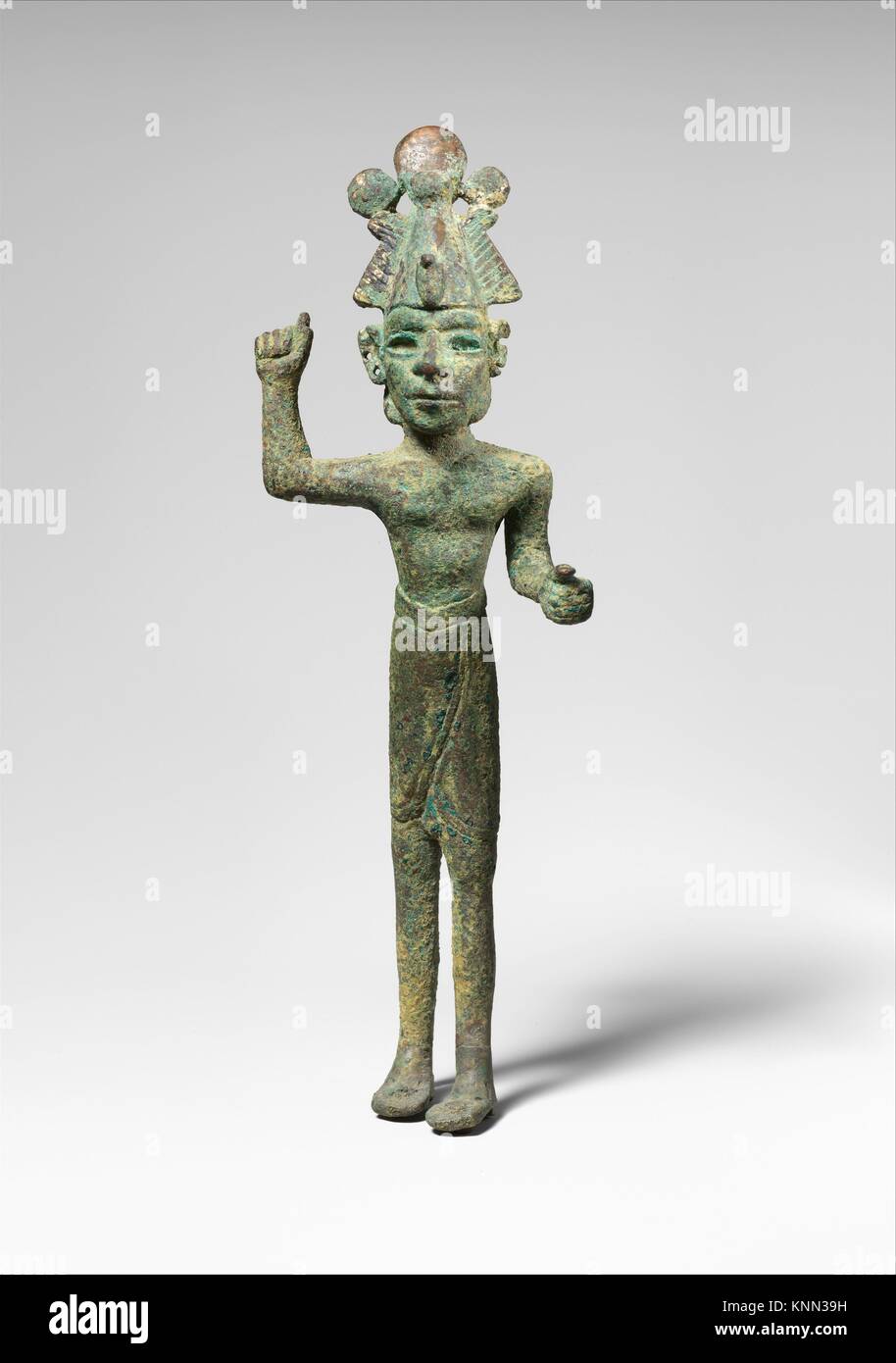 Smiting god, wearing an Egyptian atef crown. Period: Late Bronze Age; Date: ca. 15th-14th century B.C; Geography: Levant; Culture: Canaanite; Medium: Stock Photo