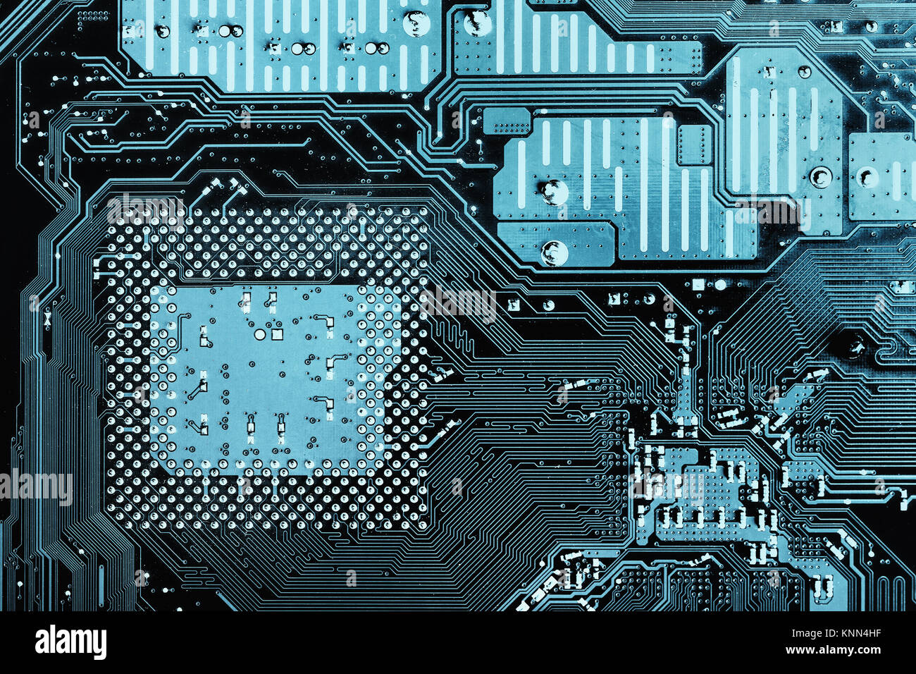 Blue circuit board background of computer motherboard, Circuit board background. Close up of a printed red computer circuit board Stock Photo