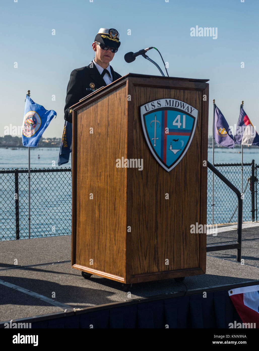 MIDWAY MUSEUM, Calif. (Dec. 01, 2017) CDR Danielle Defant gives a speech to guests and peers during USS Paul Hamilton's (DDG 60) change of command ceremony. During the ceremony CDR Edward Bertucci relieved Defant as commanding officer of USS Paul Hamilton. (U.S. Navy Stock Photo