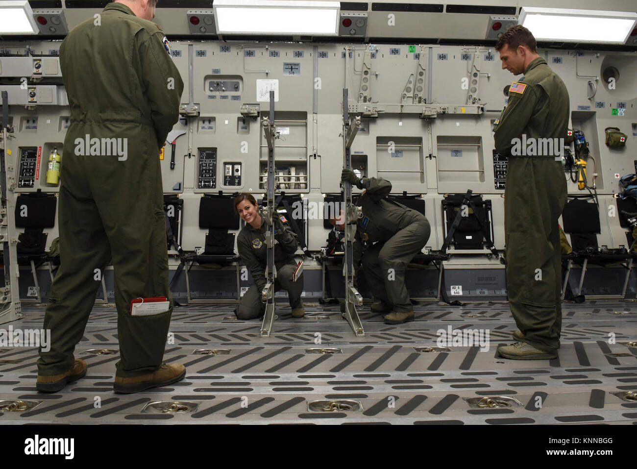 U.S. Air Force 1st Lt. Audra Straughn, (left) a flight nurse with the