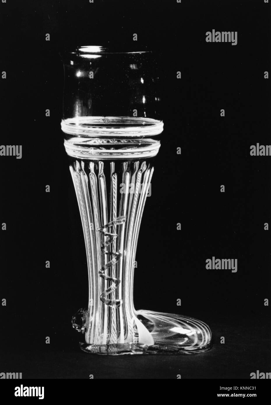 Glass boot-shaped drinking vessel from The Met collection, illustrating ...