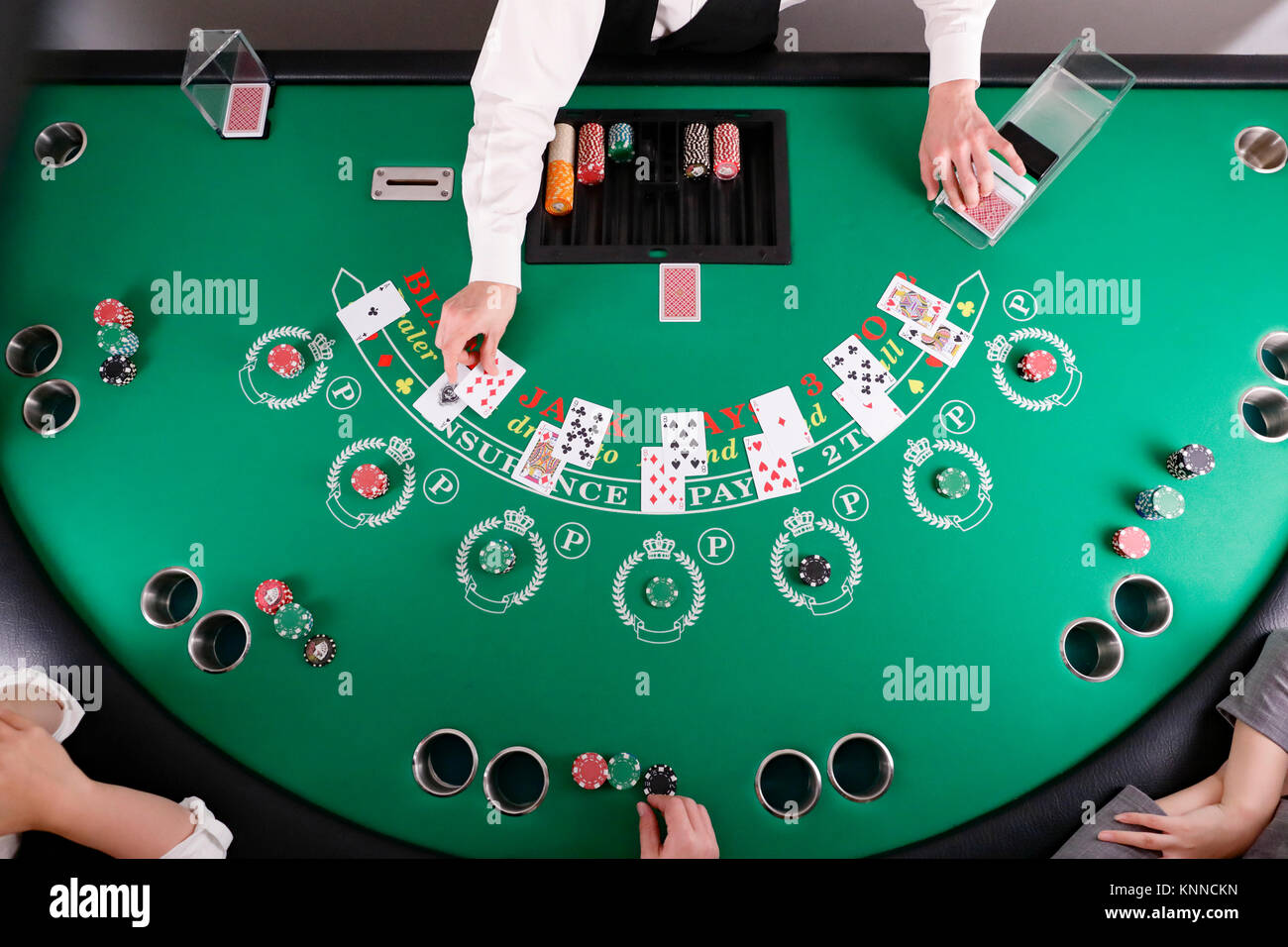 Black Jack dealer at casino Stock Photo Alamy