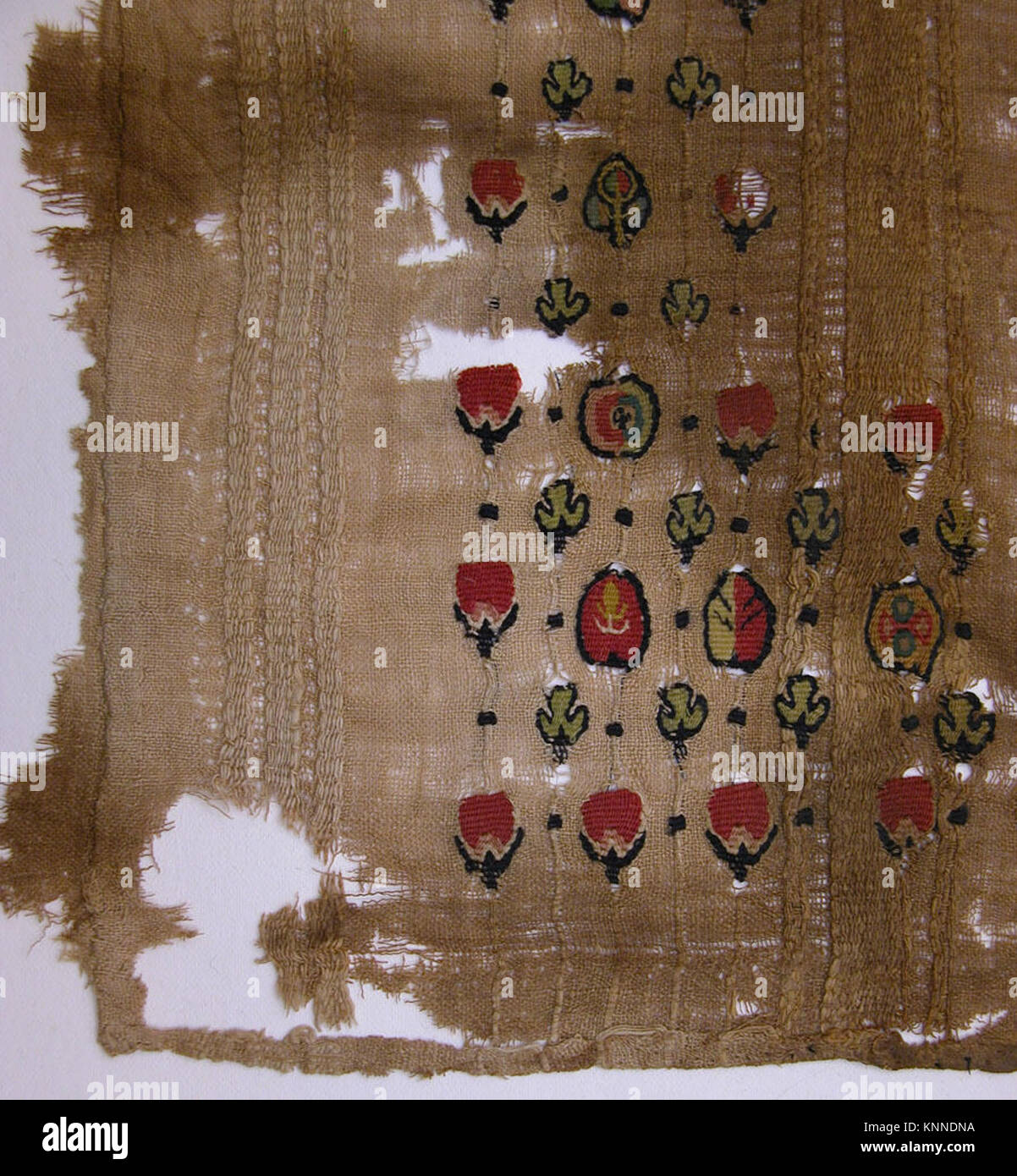 Historical Textiled Patterns This fragment with a scattered pattern shows historical textile or ...