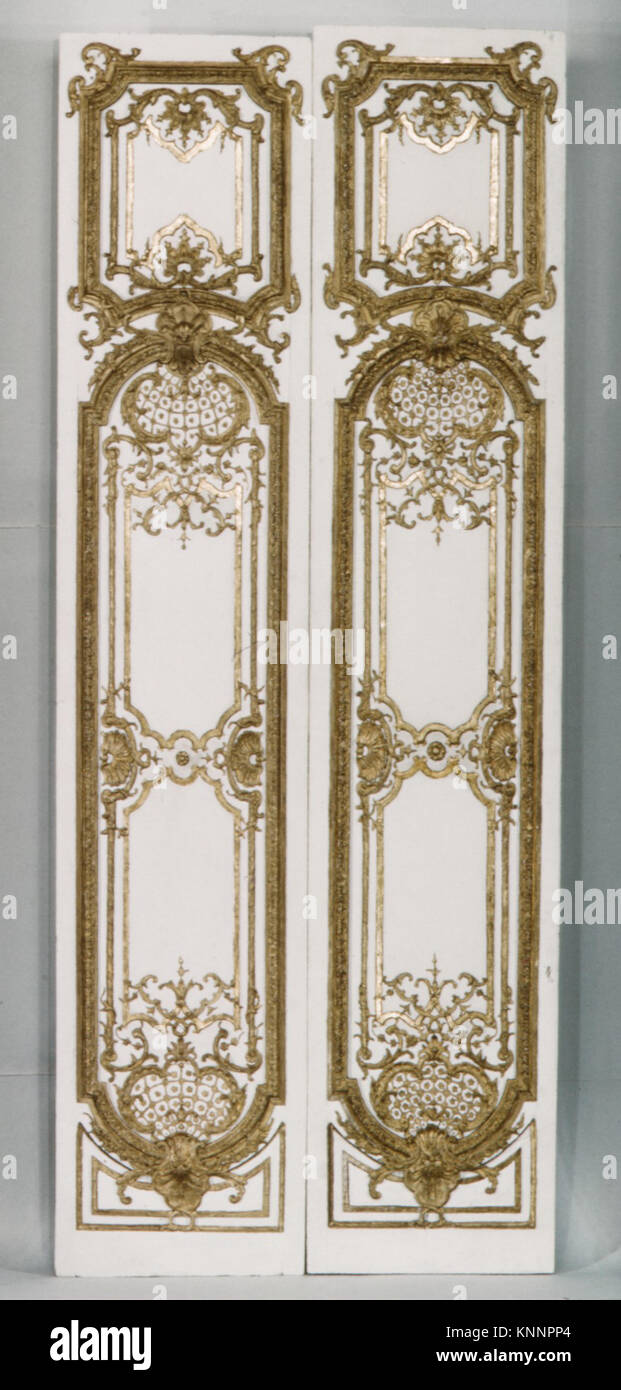 Double door- four panels, two pilasters, three gilt moldings for the door frame MET ES7663 Double door- four panels, two pilasters, three gilt moldings for the door frame MET ES7663 /189702 French, Double door: four panels, two pilasters, three gilt moldings for the door frame, ca. 1715, Carved, painted and gilded oak, a,b -  doors with their trim i,j,k: 106-1/4 x 53-1/2 in. (269.9 x 135.9 cm) c,e,f,h -  panels:  H. from 102 to 104-3/4 in. (259.1 to 266.1 cm); W. from 20-1/2 to 22 in. (52.1 to 55.9 cm) d - pilaster:  94-1/2 x 12 in. (240 x 30.5 cm) g - pilaster: 94-1/2 x 12-1/2 in. (240 x 31.8 Stock Photo