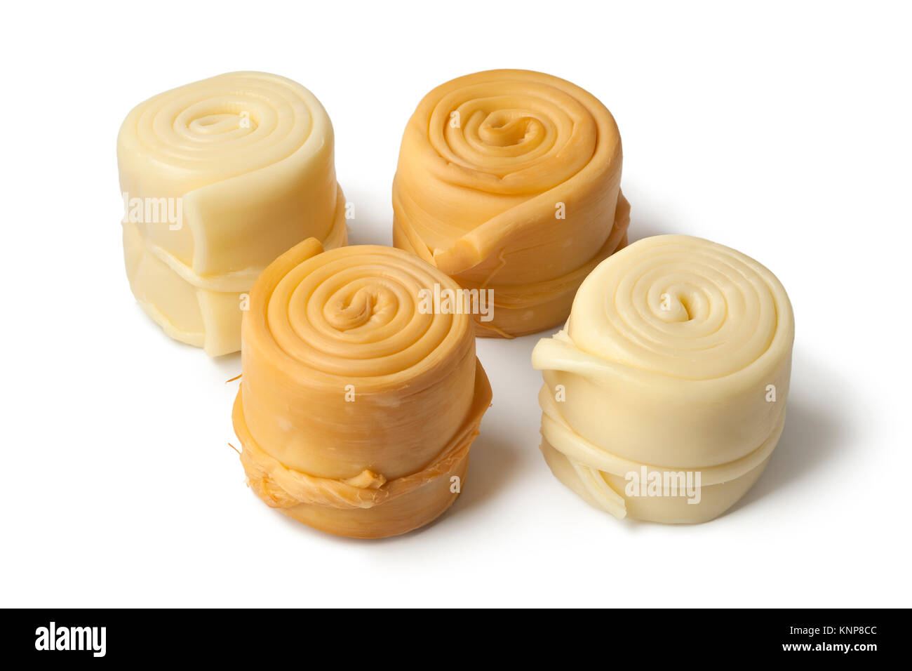 Traditional Slovak semi fat, steamed and smoked cheese, called Parenica on white background Stock Photo