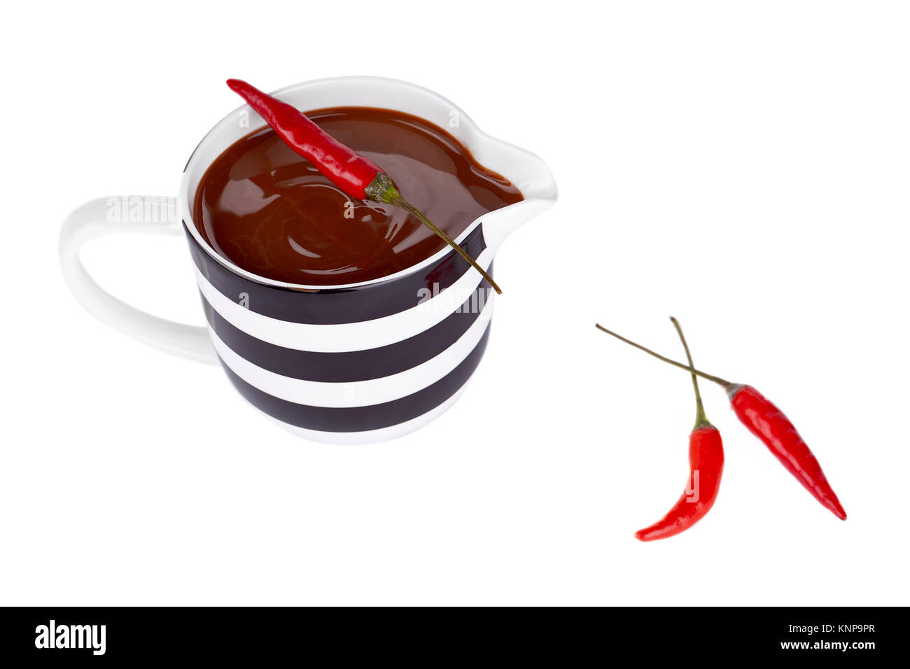 chocolate syrup with chili pepper Stock Photo Alamy
