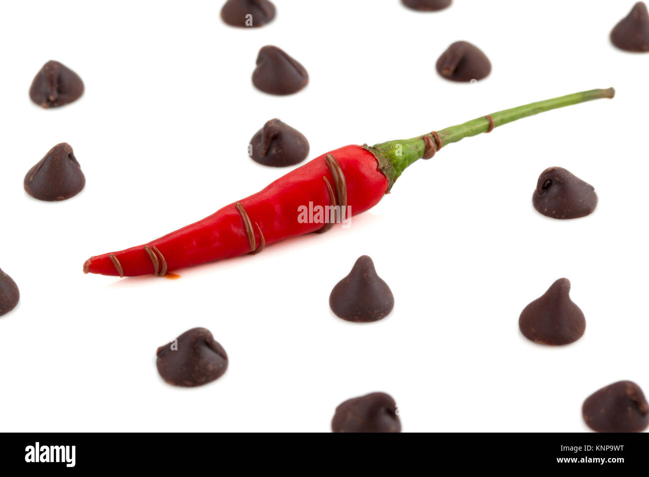chilly pepper with chocolate kisses Stock Photo Alamy