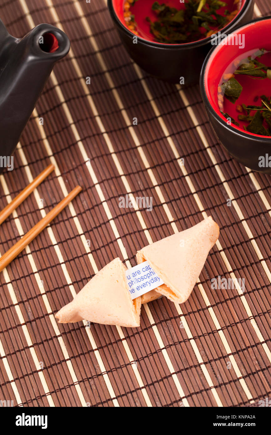 cracked open fortune cookie Stock Photo Alamy
