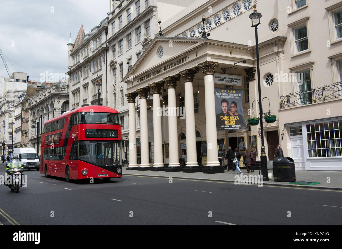 A New Bus for London travels past the Theater Royal Haymarket Stock Photo
